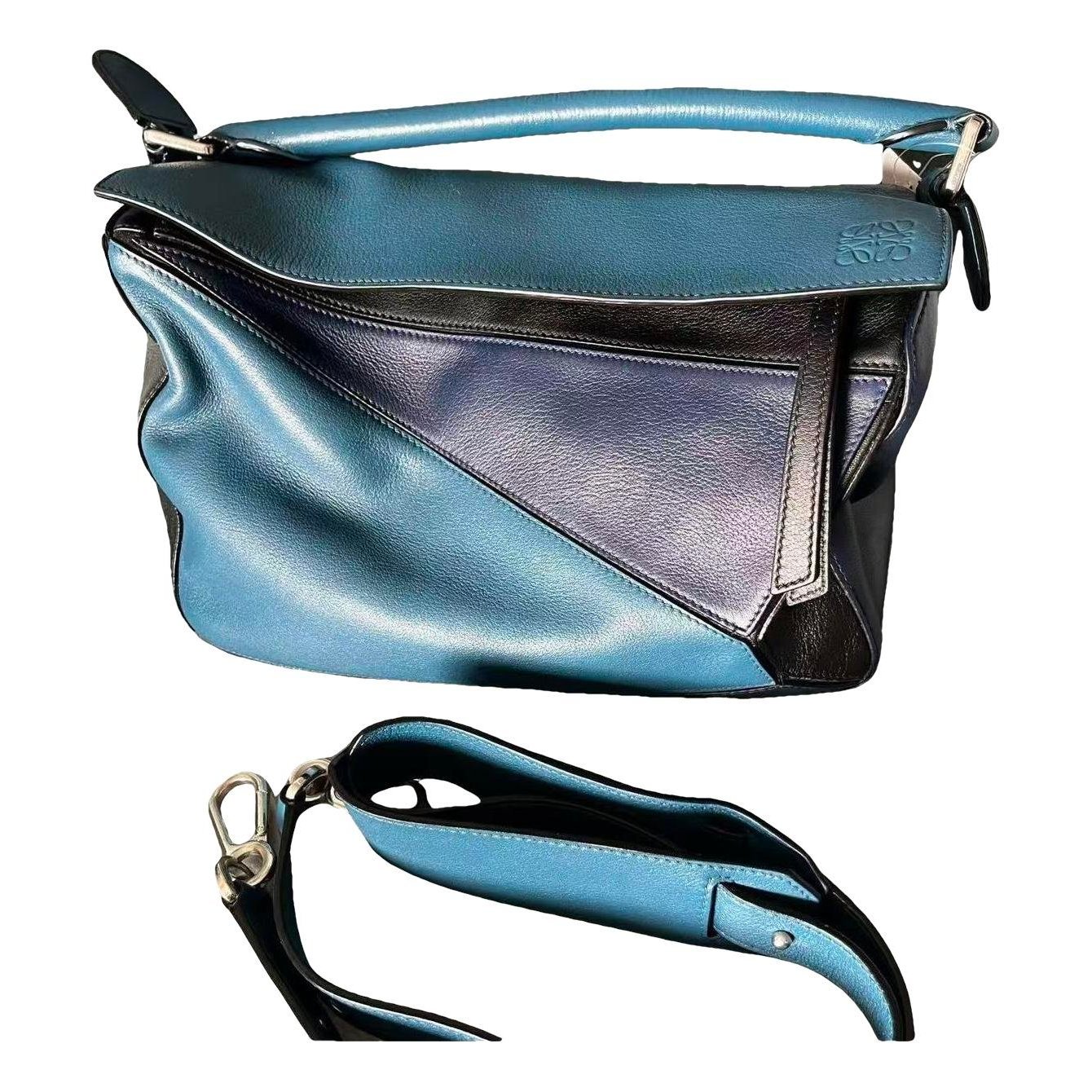 Puzzle leather handbag