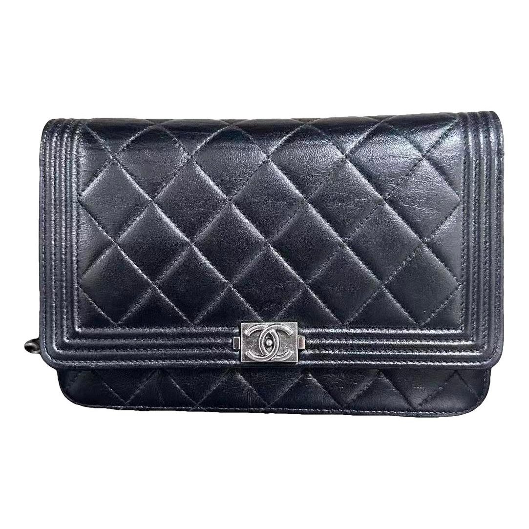 Wallet On Chain Boy Half Flap leather handbag