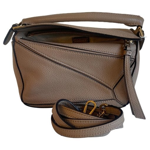 Puzzle leather handbag