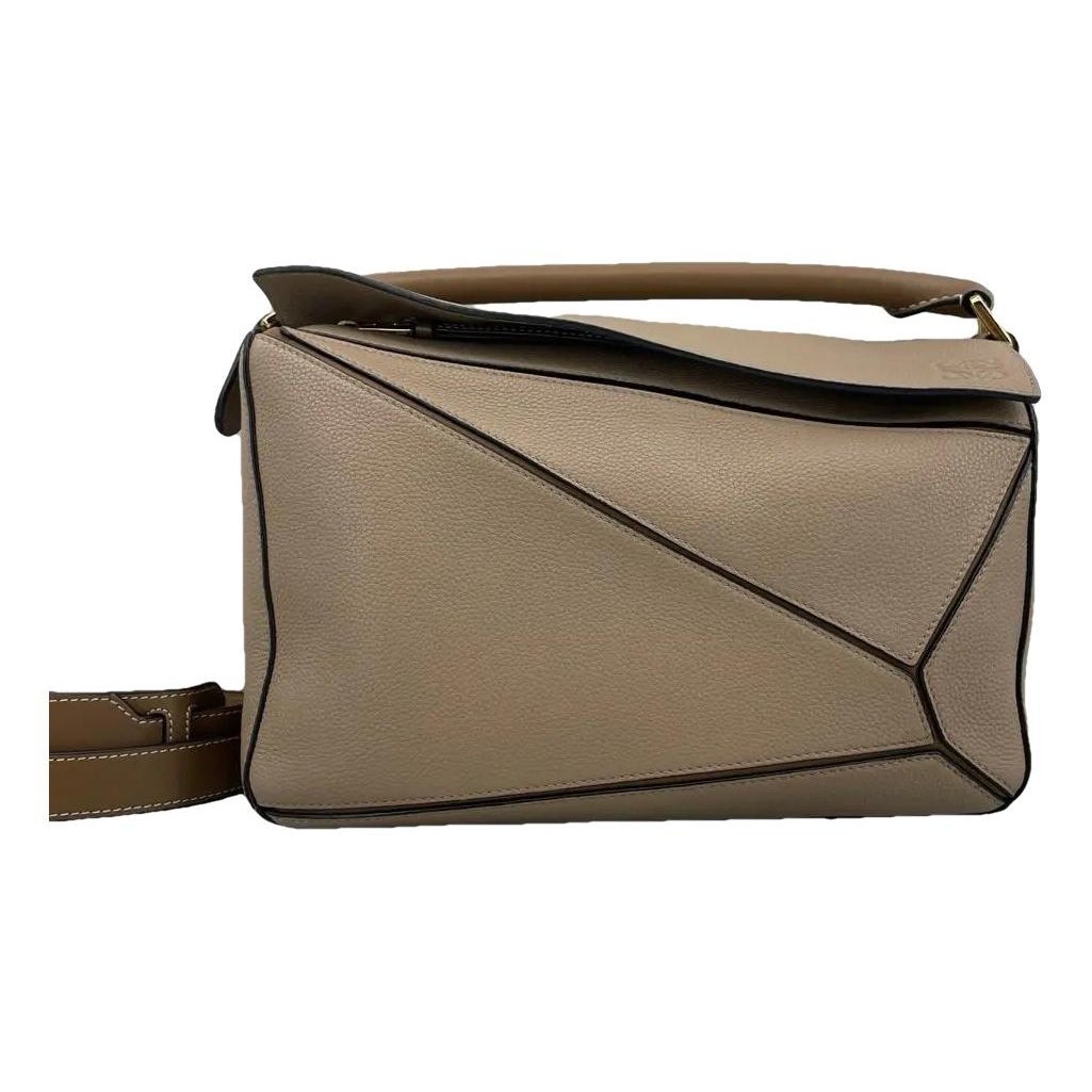 Puzzle leather crossbody bag
