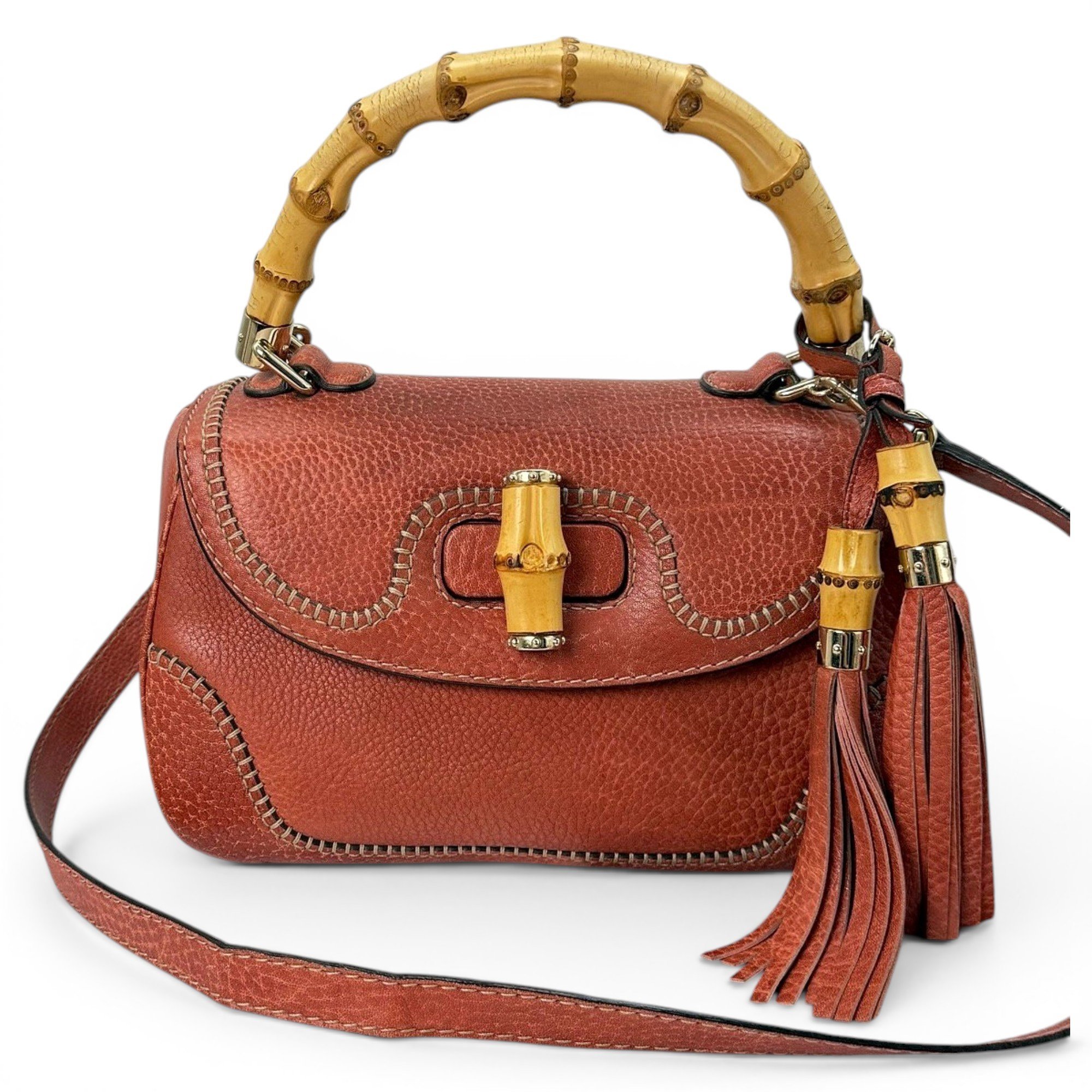 Convertible Pompon Bamboo Top Handle leather handbag