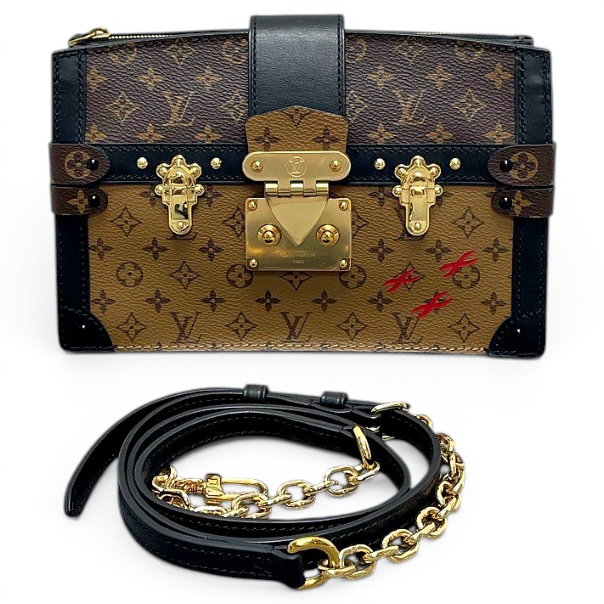 Pochette Trunk leather handbag