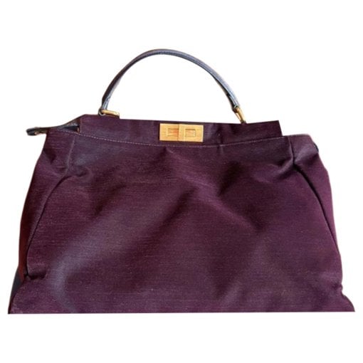 Peekaboo velvet handbag