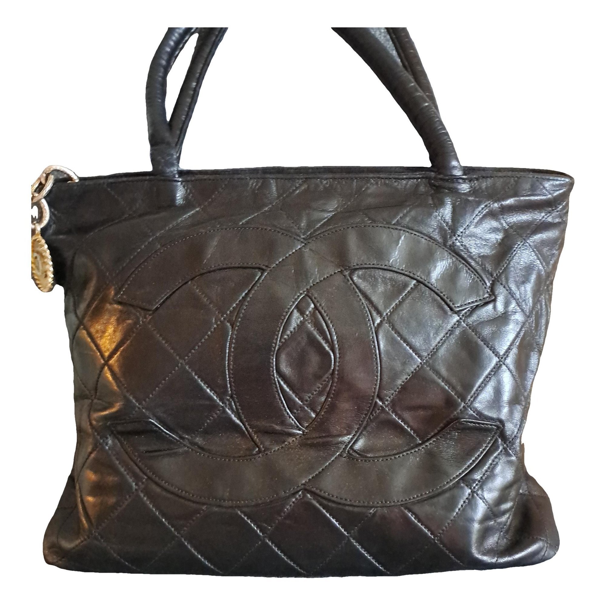 Médaillon leather handbag