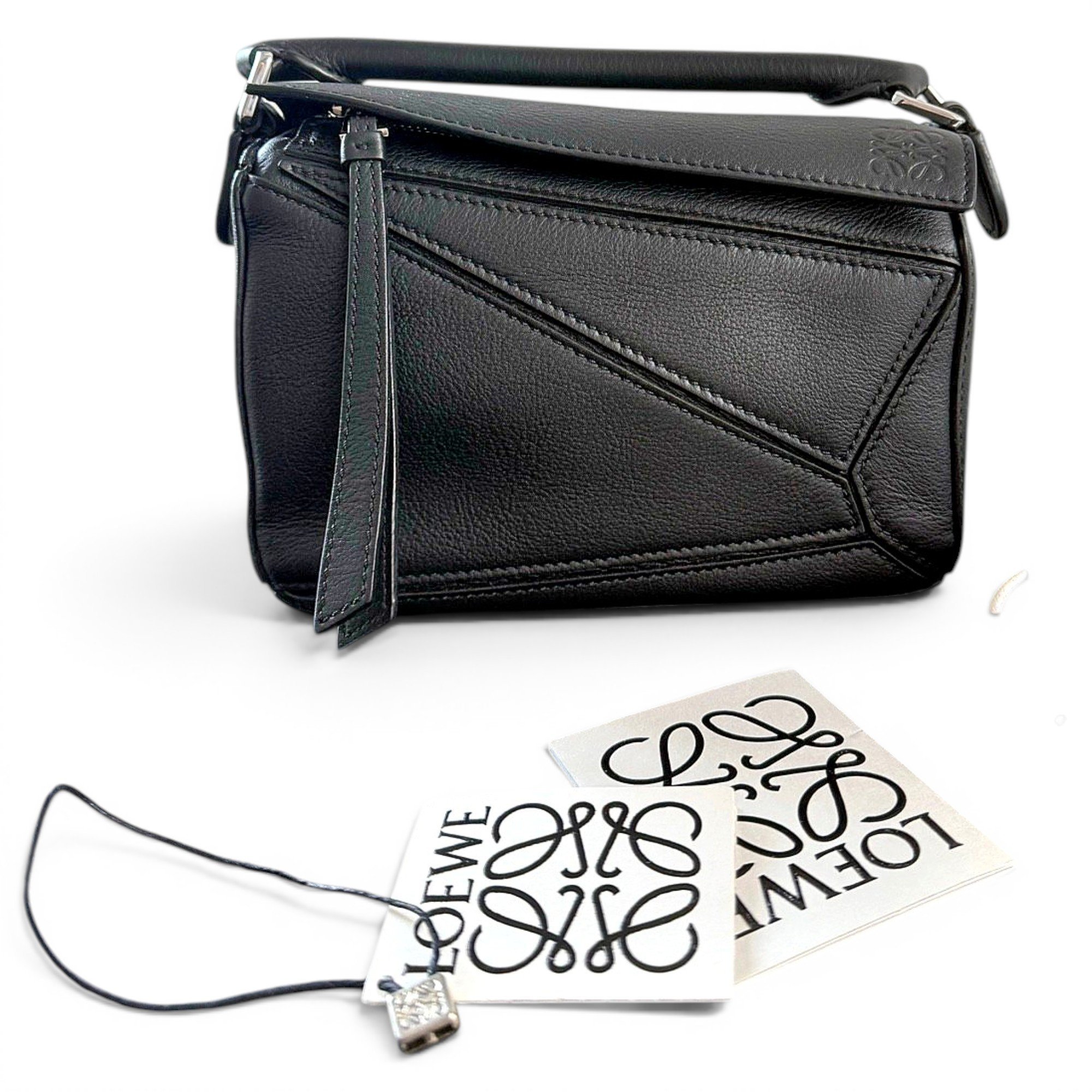 Puzzle leather handbag