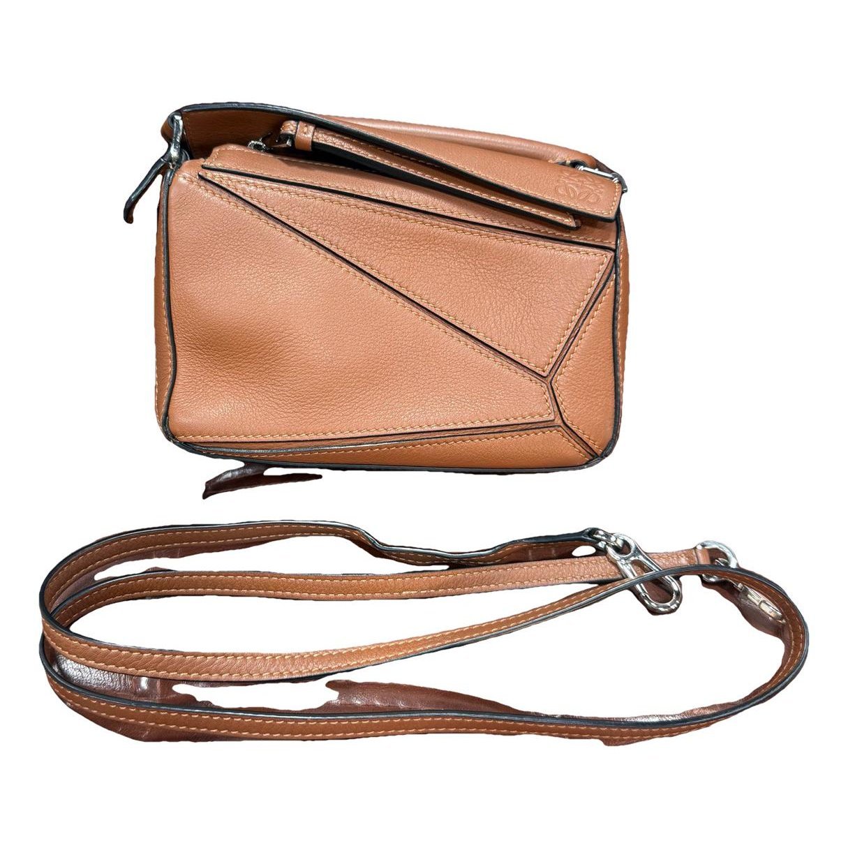 Puzzle leather handbag