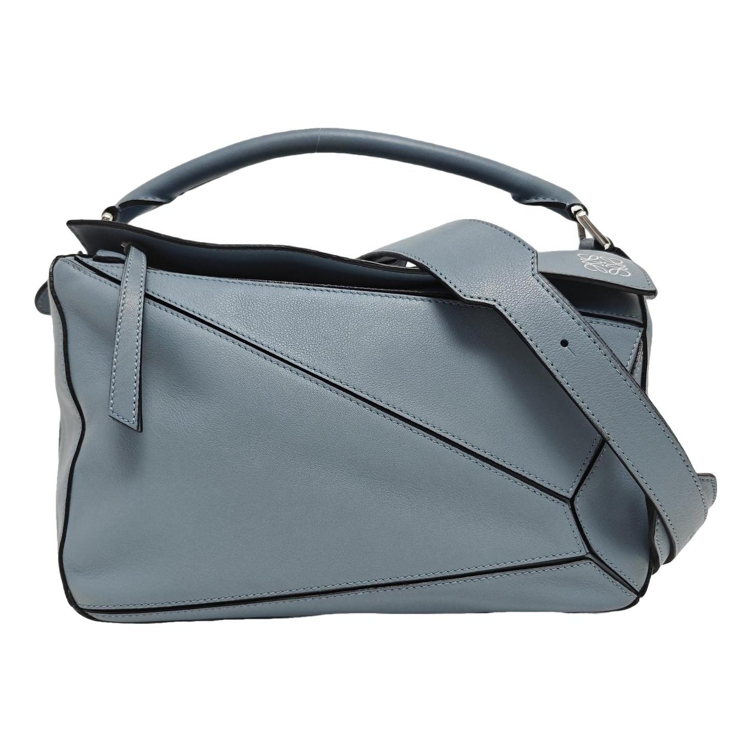 Puzzle leather handbag
