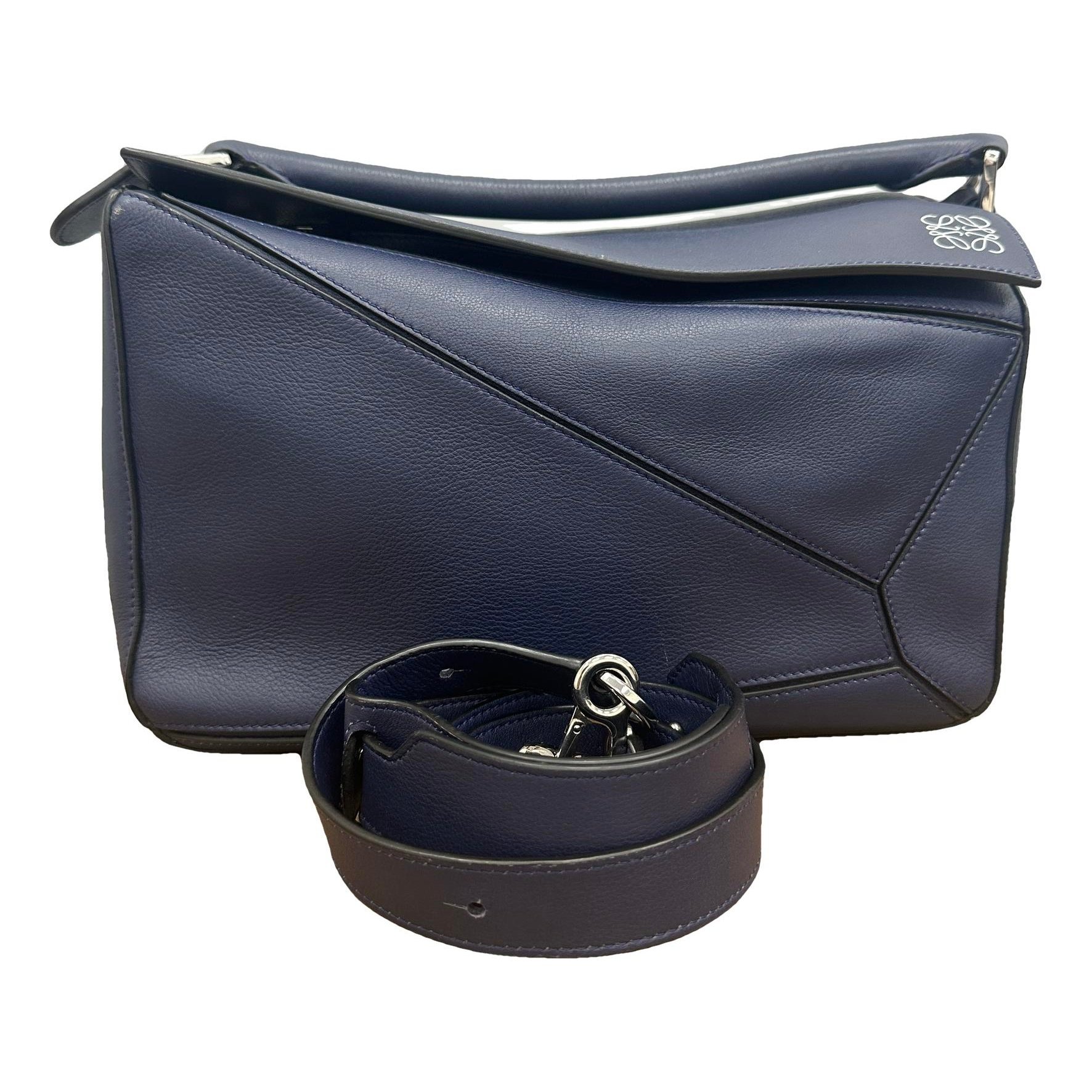 Puzzle leather handbag