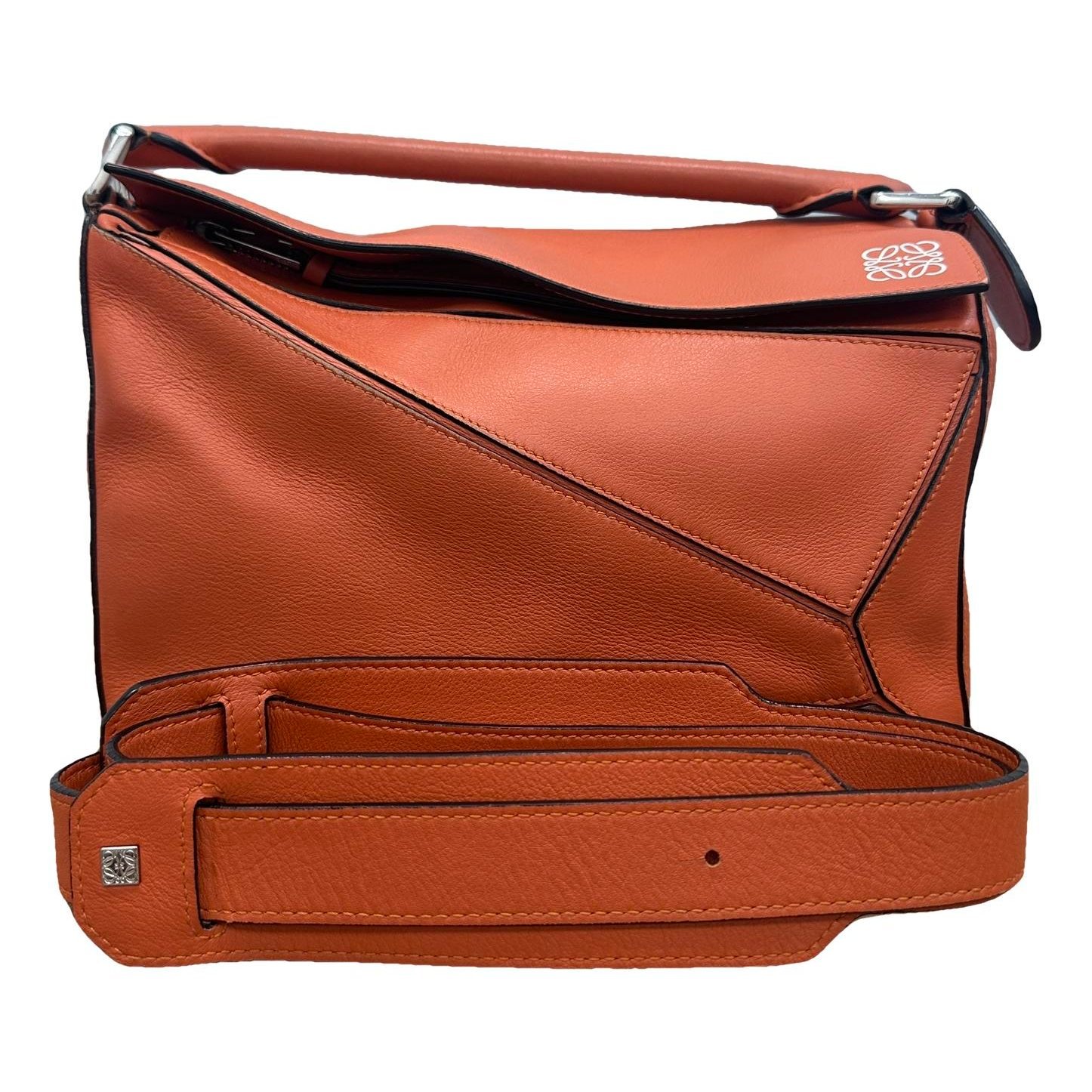 Puzzle leather handbag