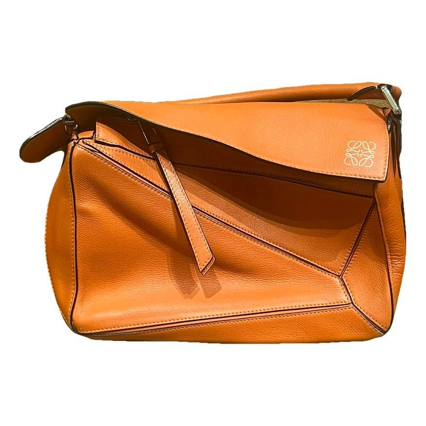 Puzzle leather handbag