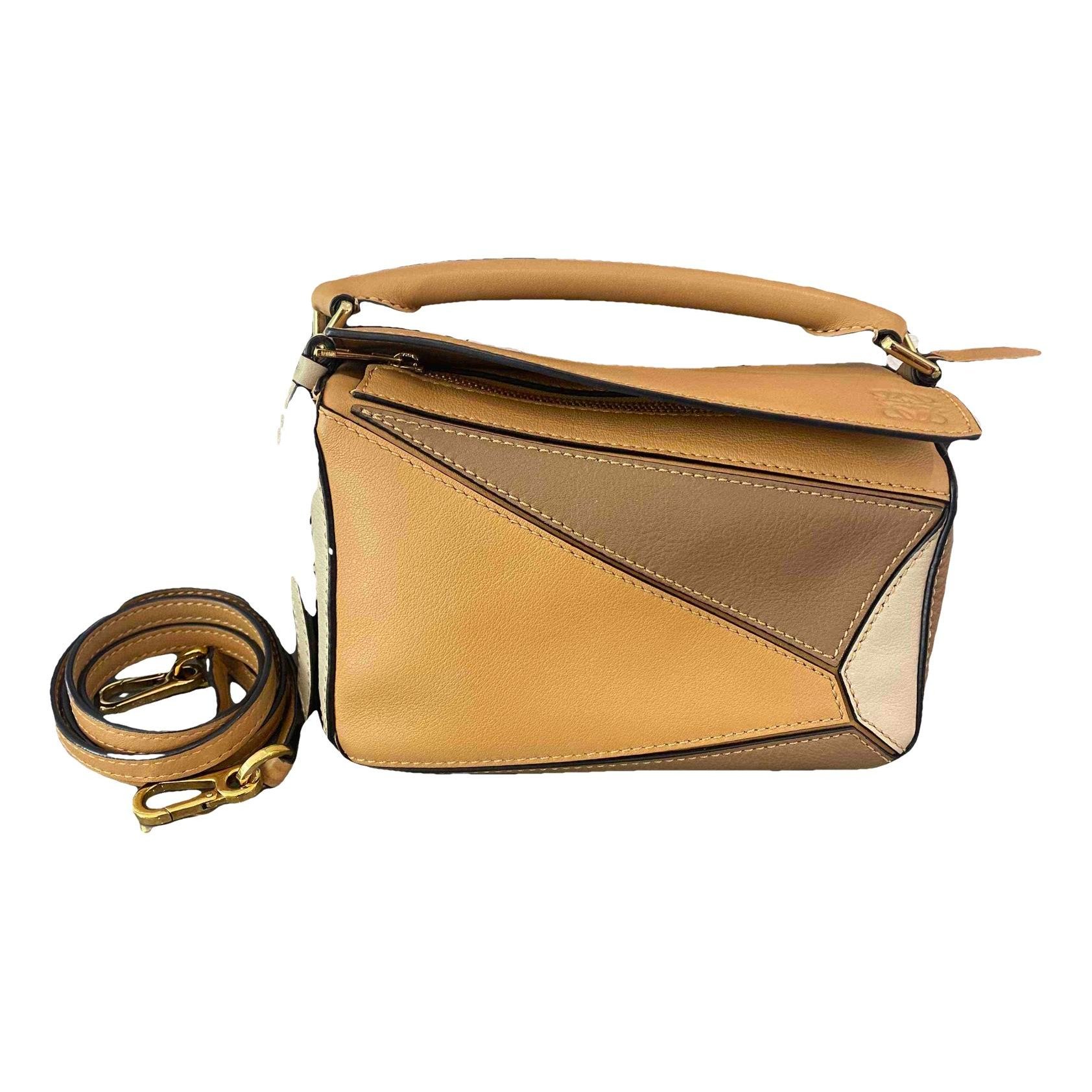 Puzzle leather handbag