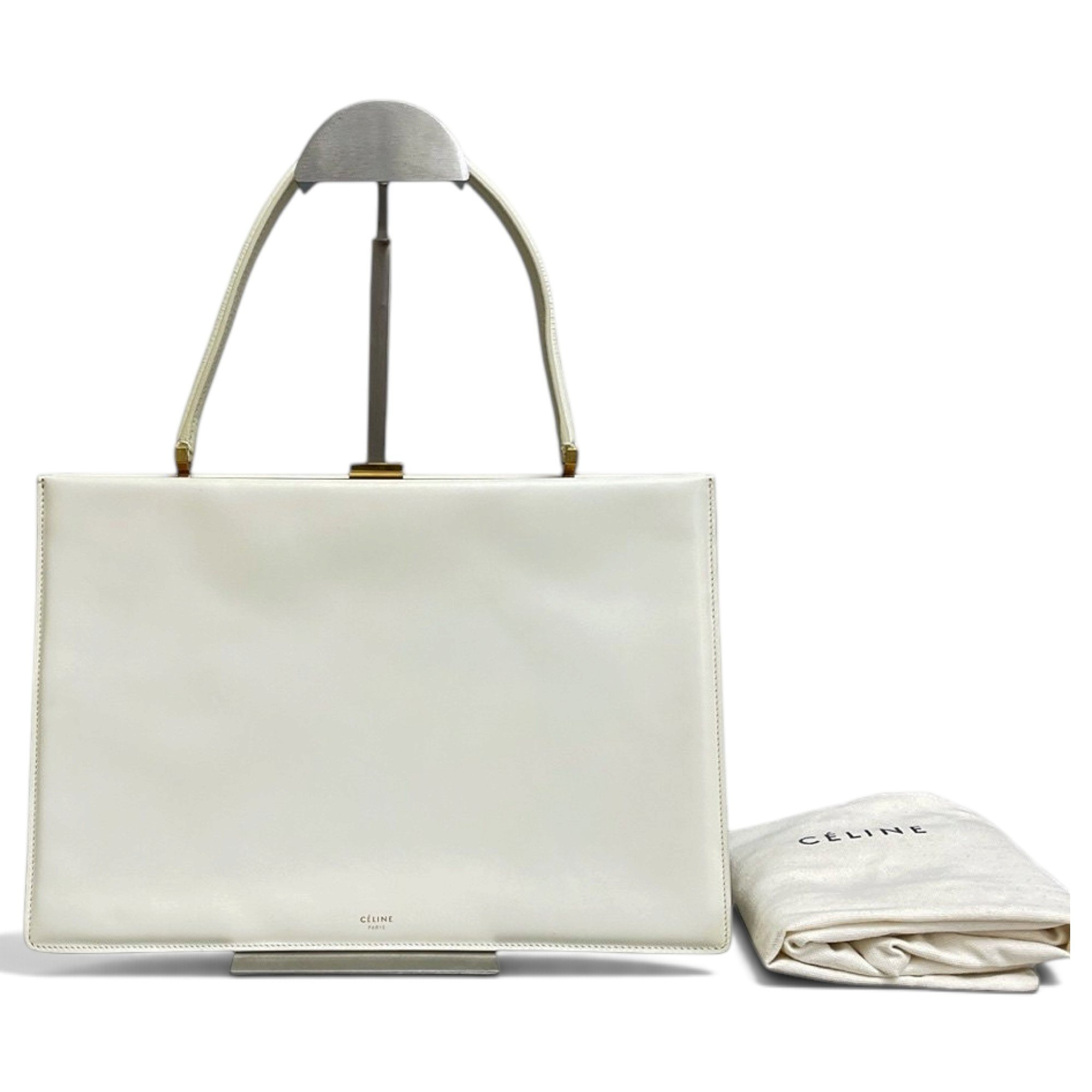 Clasp leather handbag