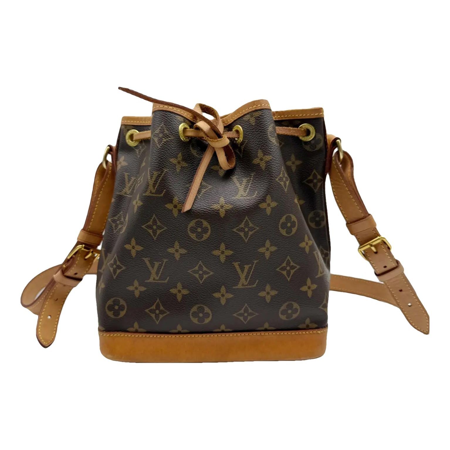 NéoNoé vinyl crossbody bag