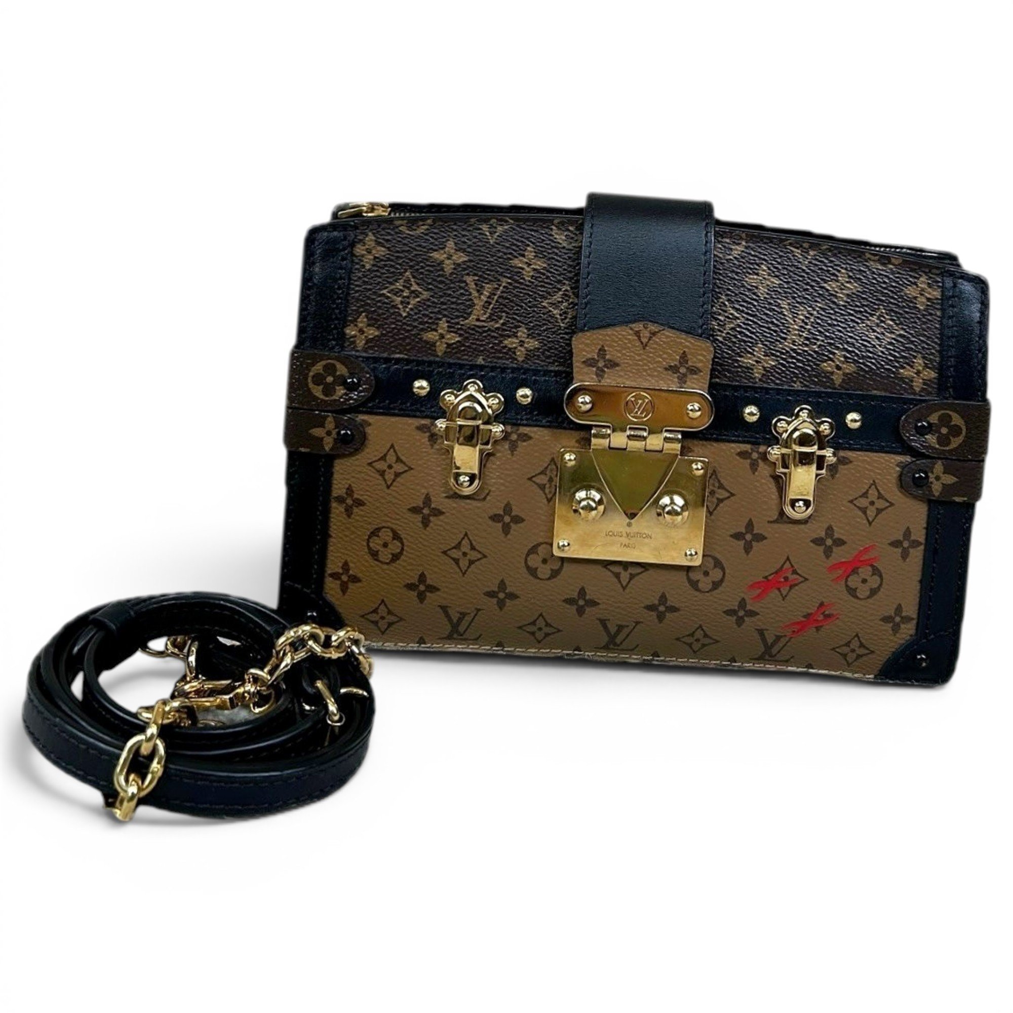 Pochette Trunk leather handbag