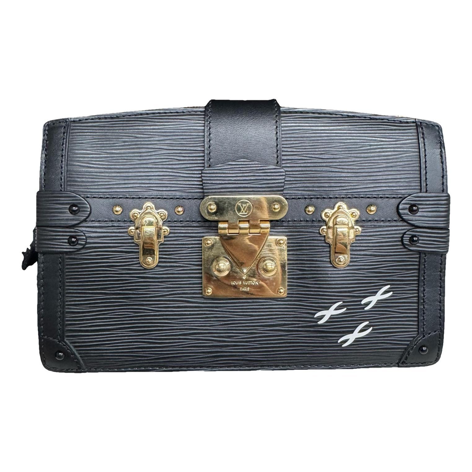 Pochette Trunk leather handbag