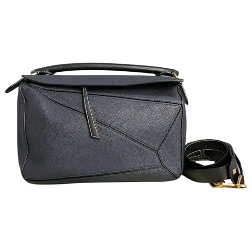Puzzle leather handbag