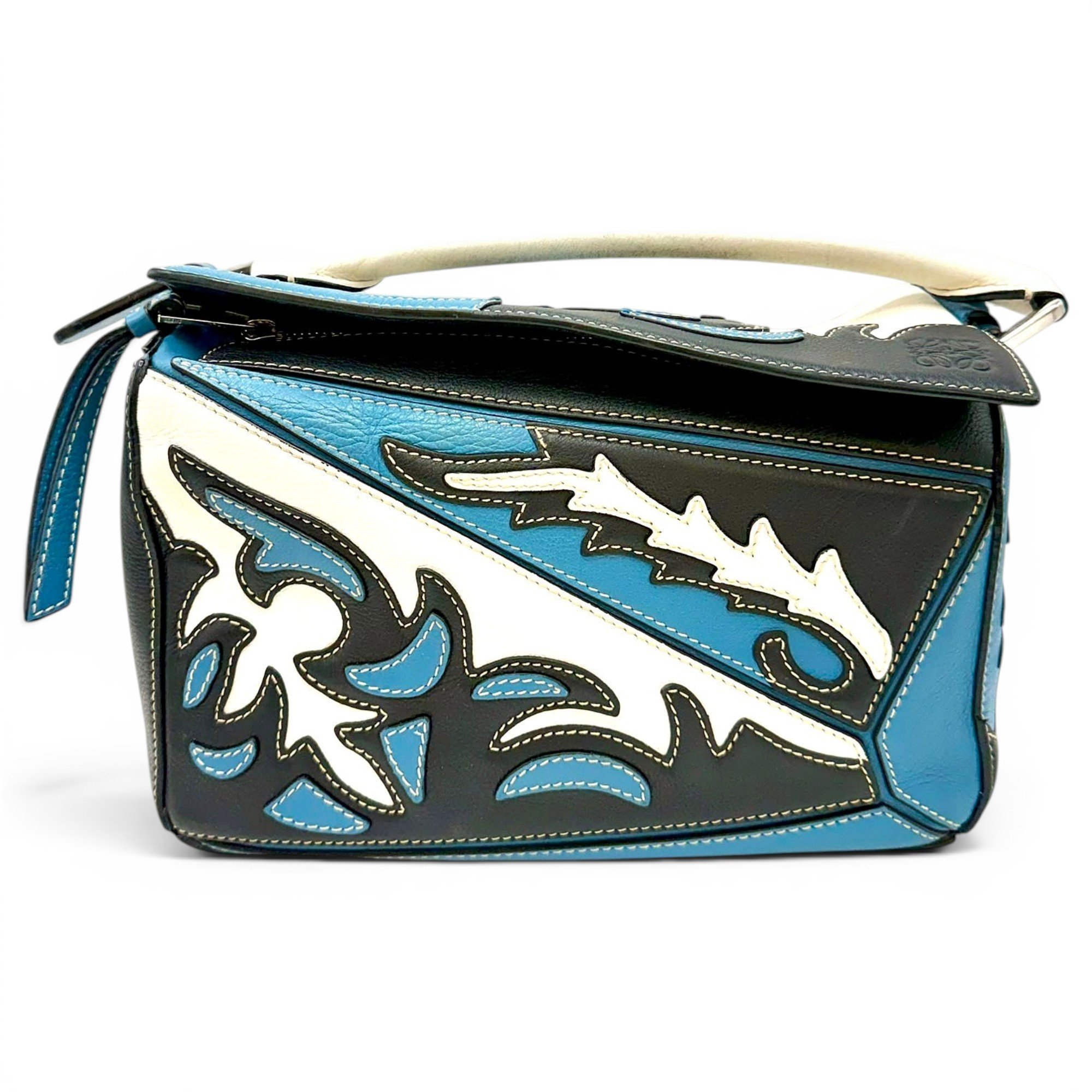 Puzzle leather handbag