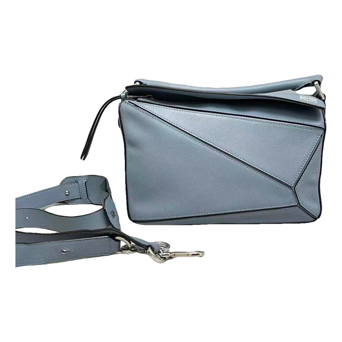 Puzzle leather handbag