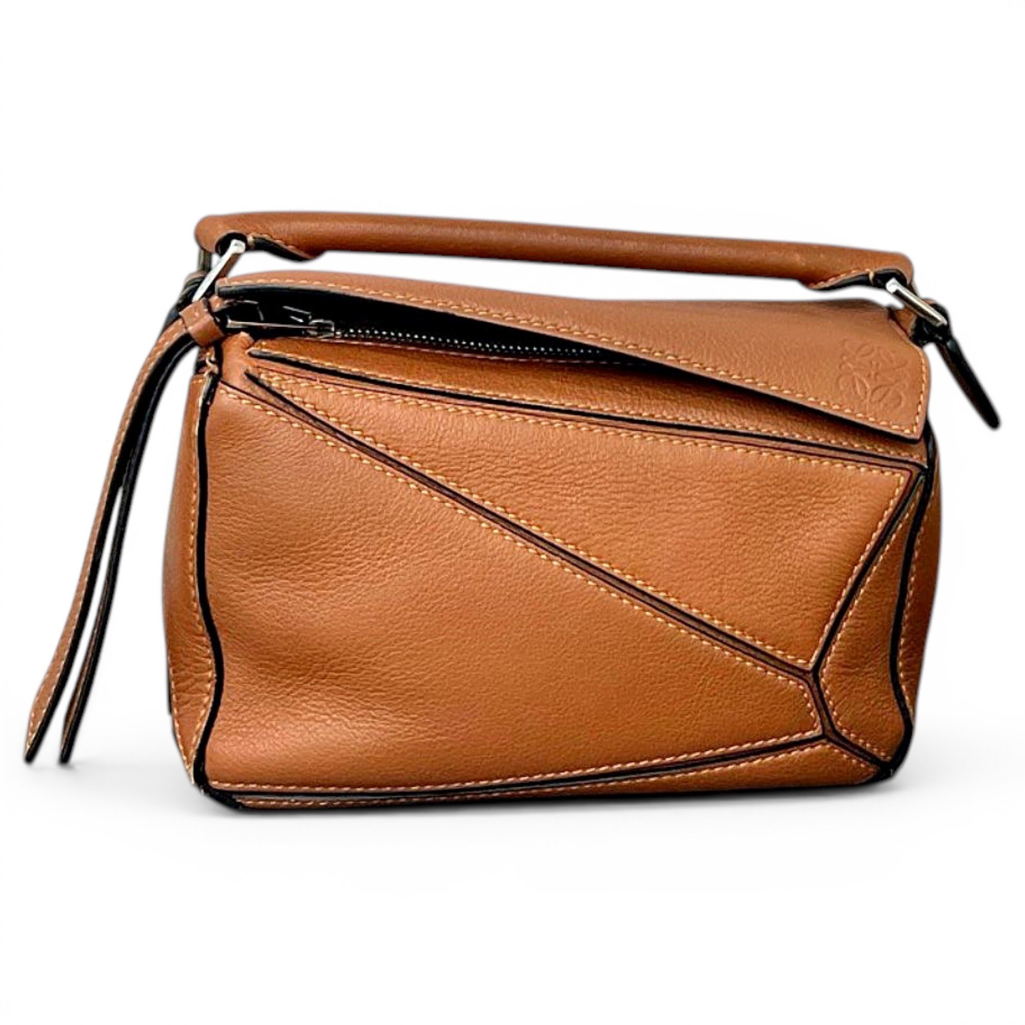 Puzzle leather handbag