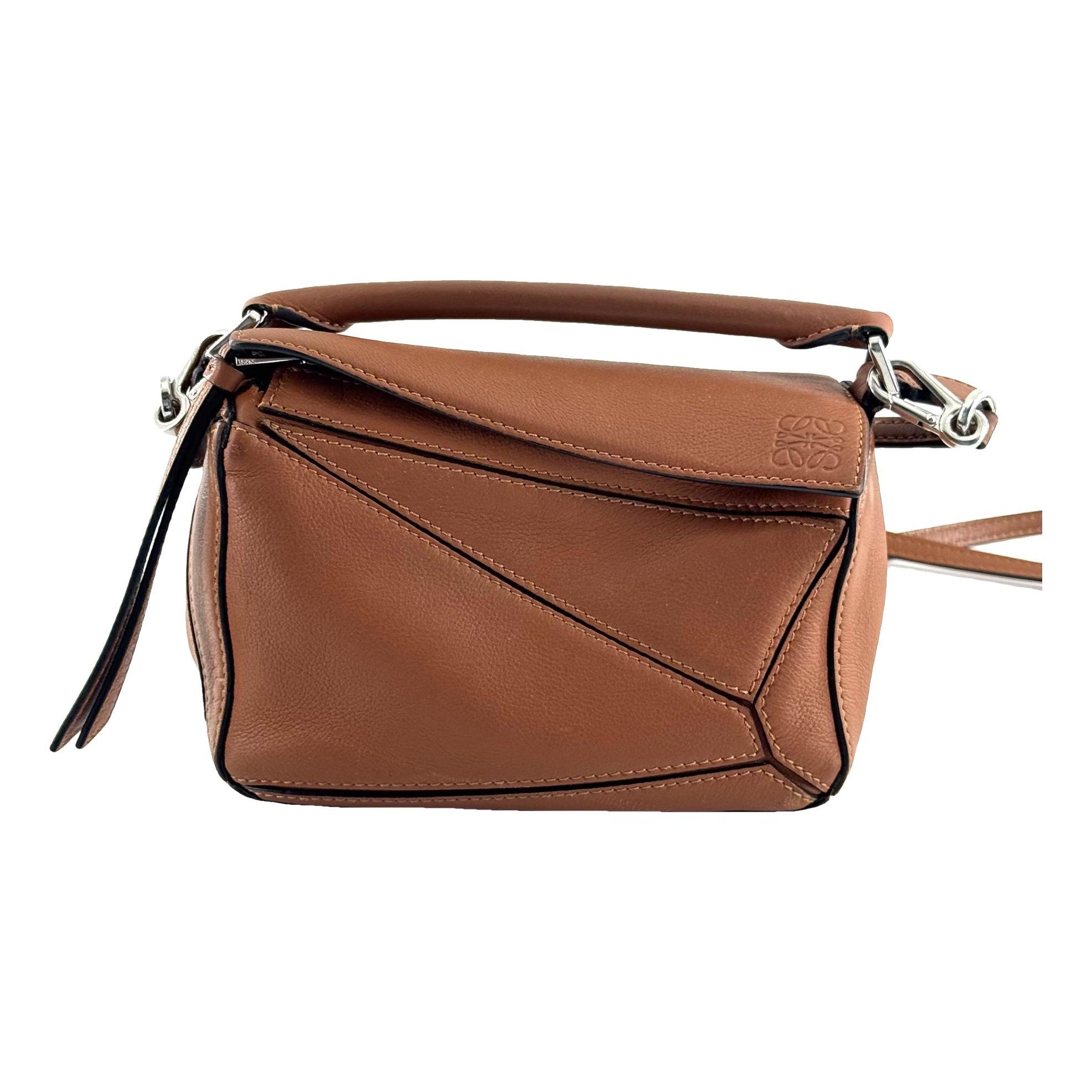 Puzzle leather handbag