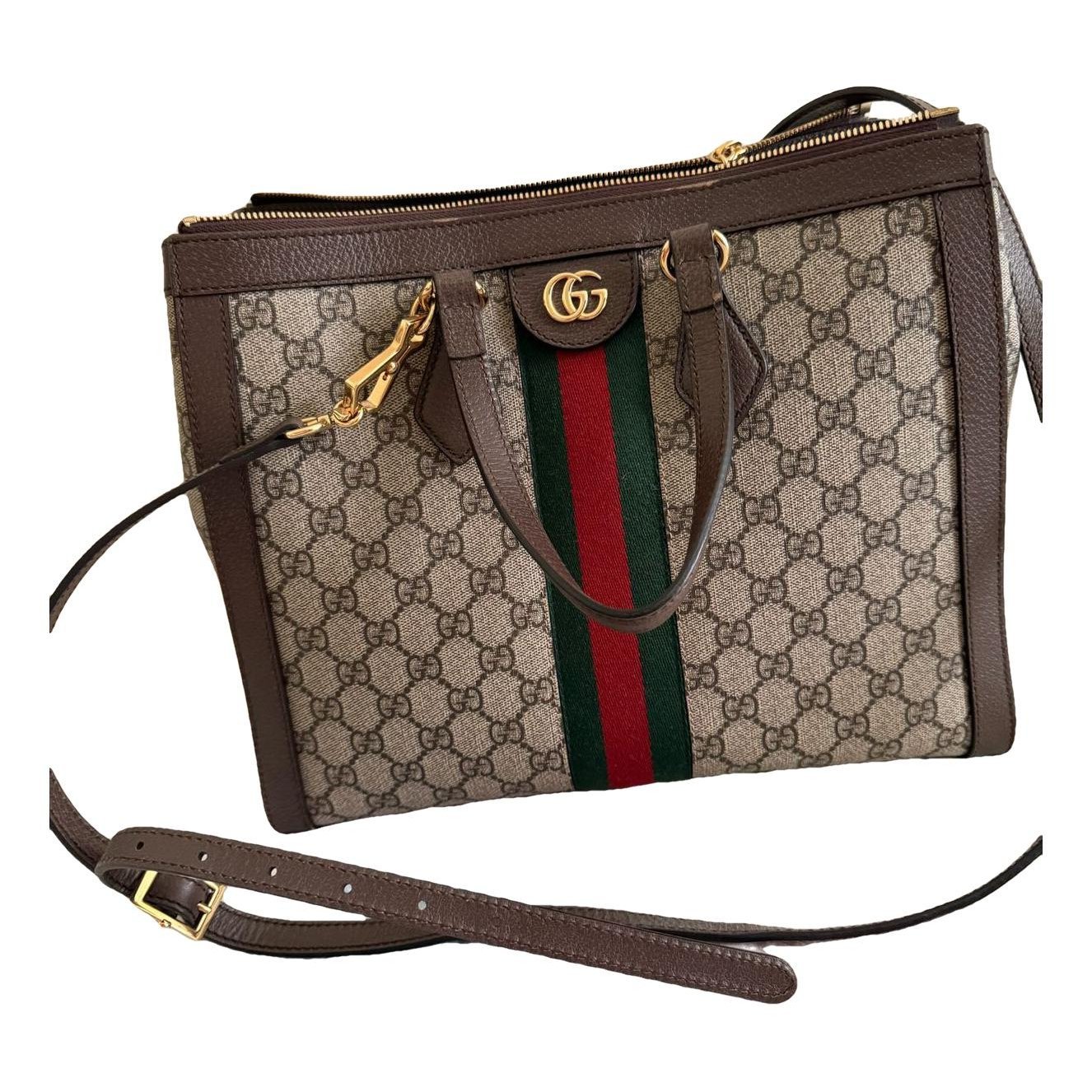 Ophidia Top Handle leather handbag