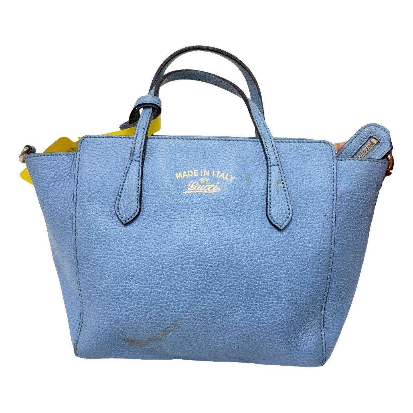 Swing leather handbag
