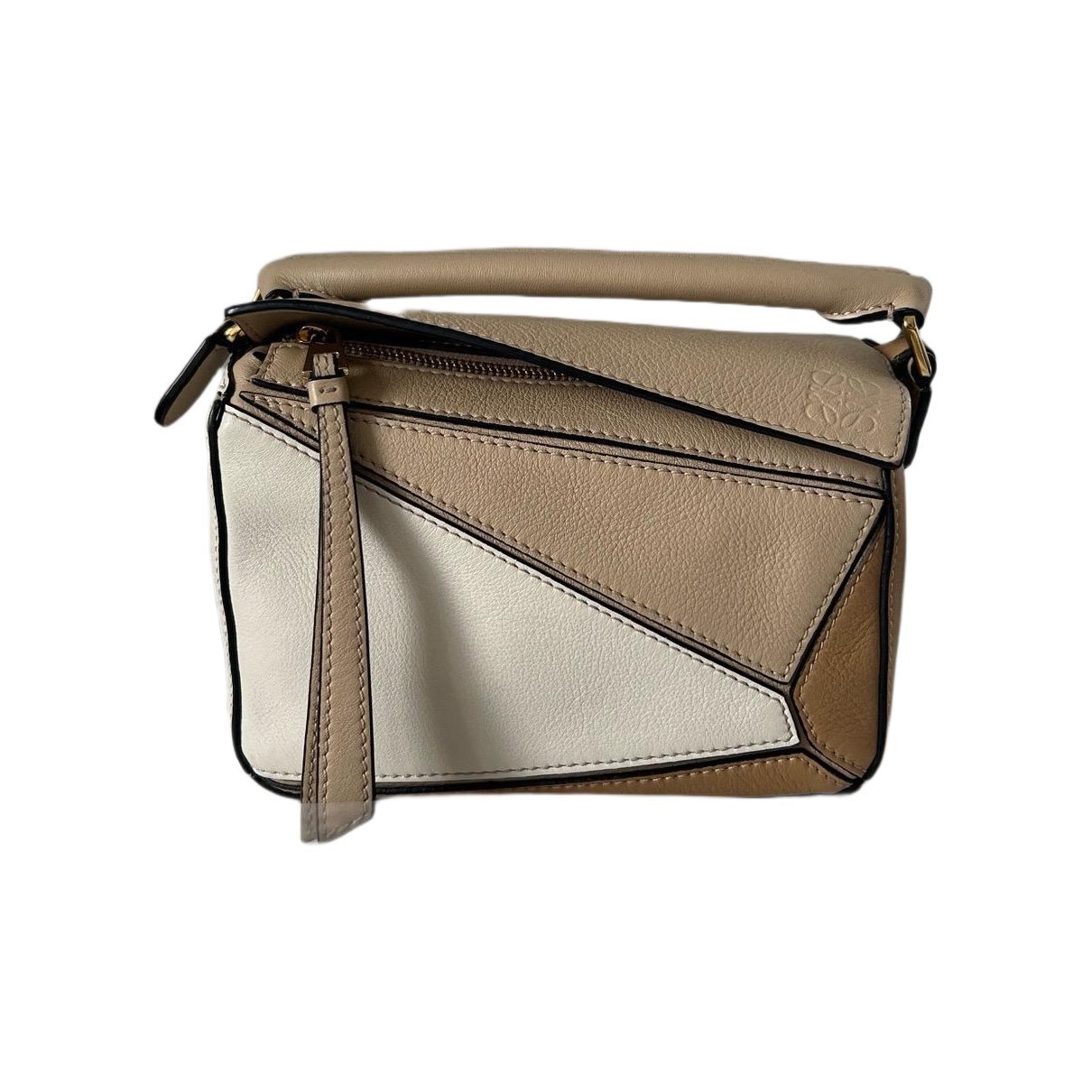 Puzzle leather handbag
