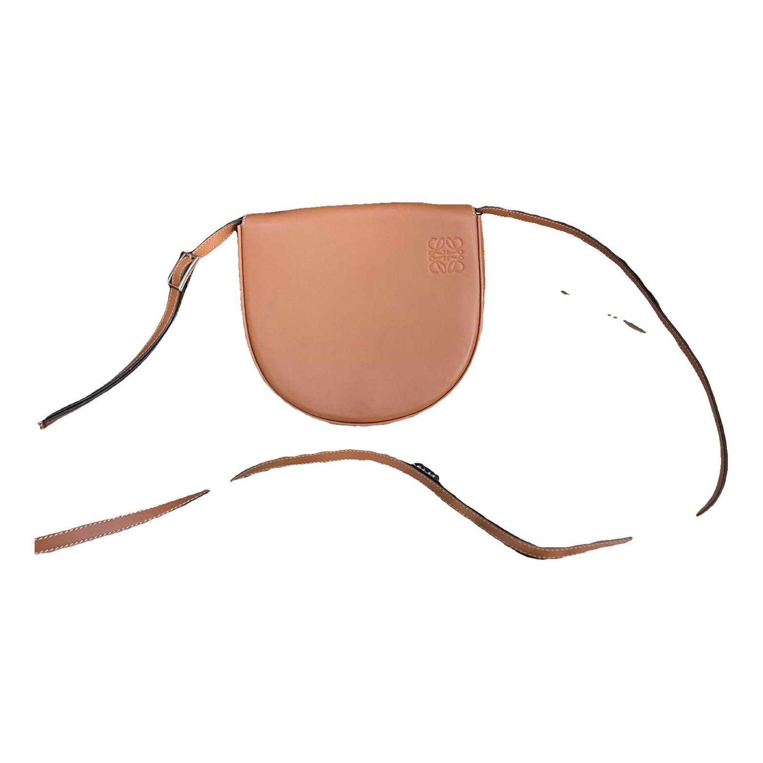 Heel leather handbag