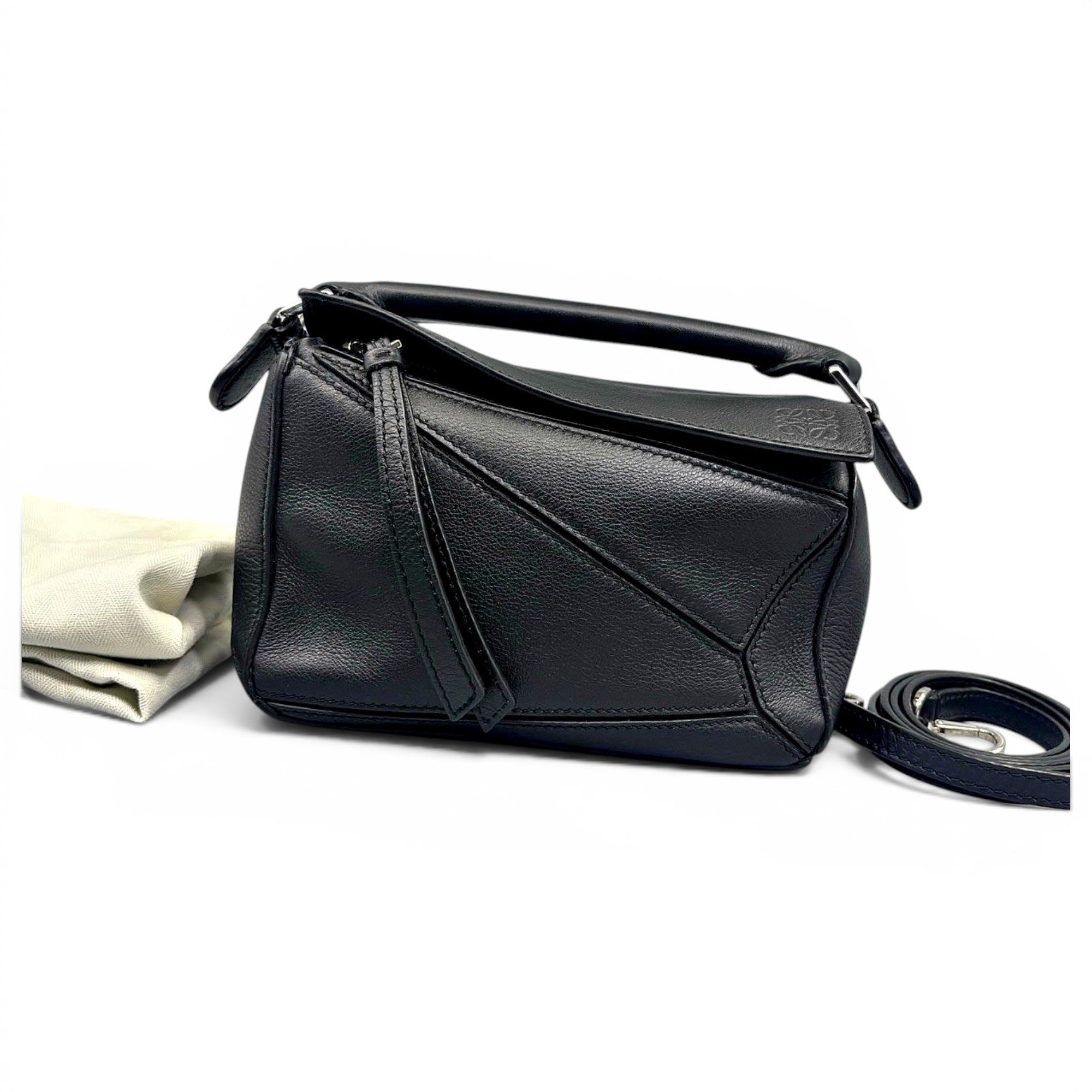 Puzzle leather handbag
