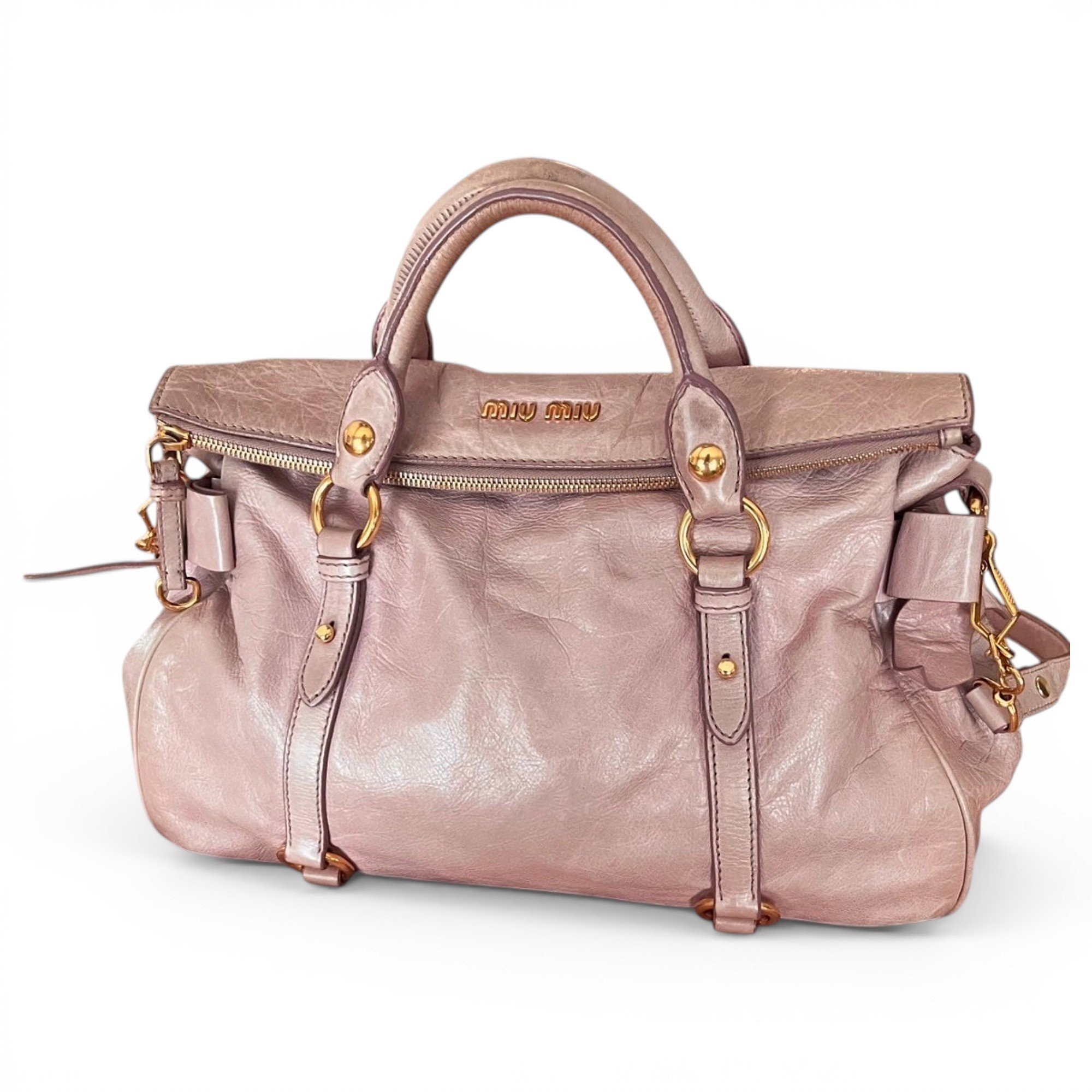 Bow bag leather handbag