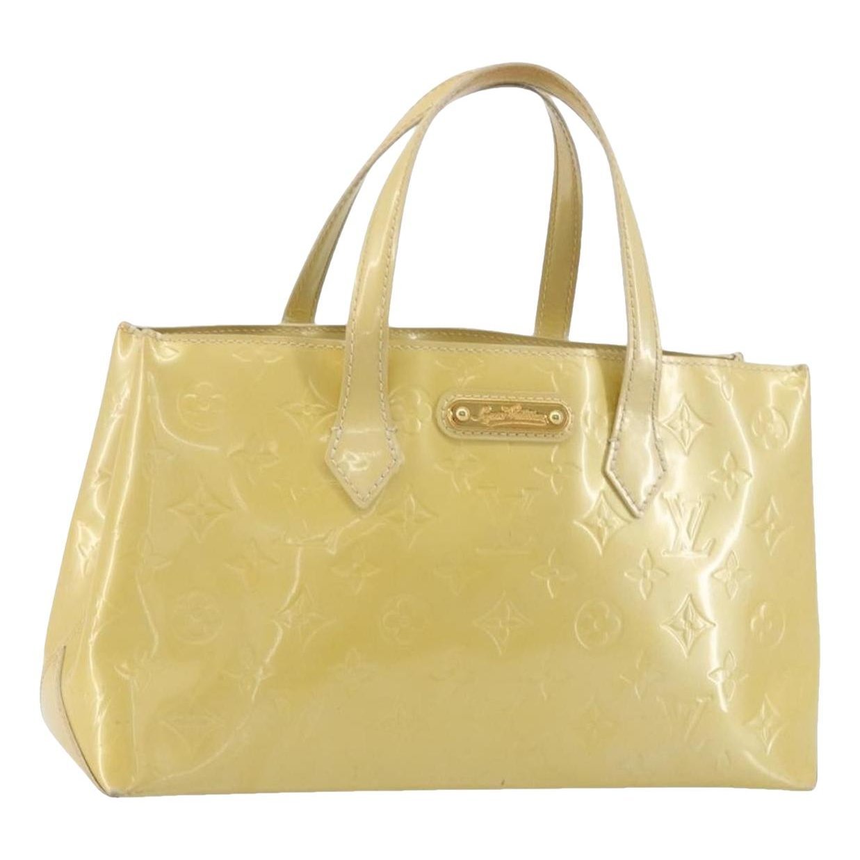 Reade patent leather handbag