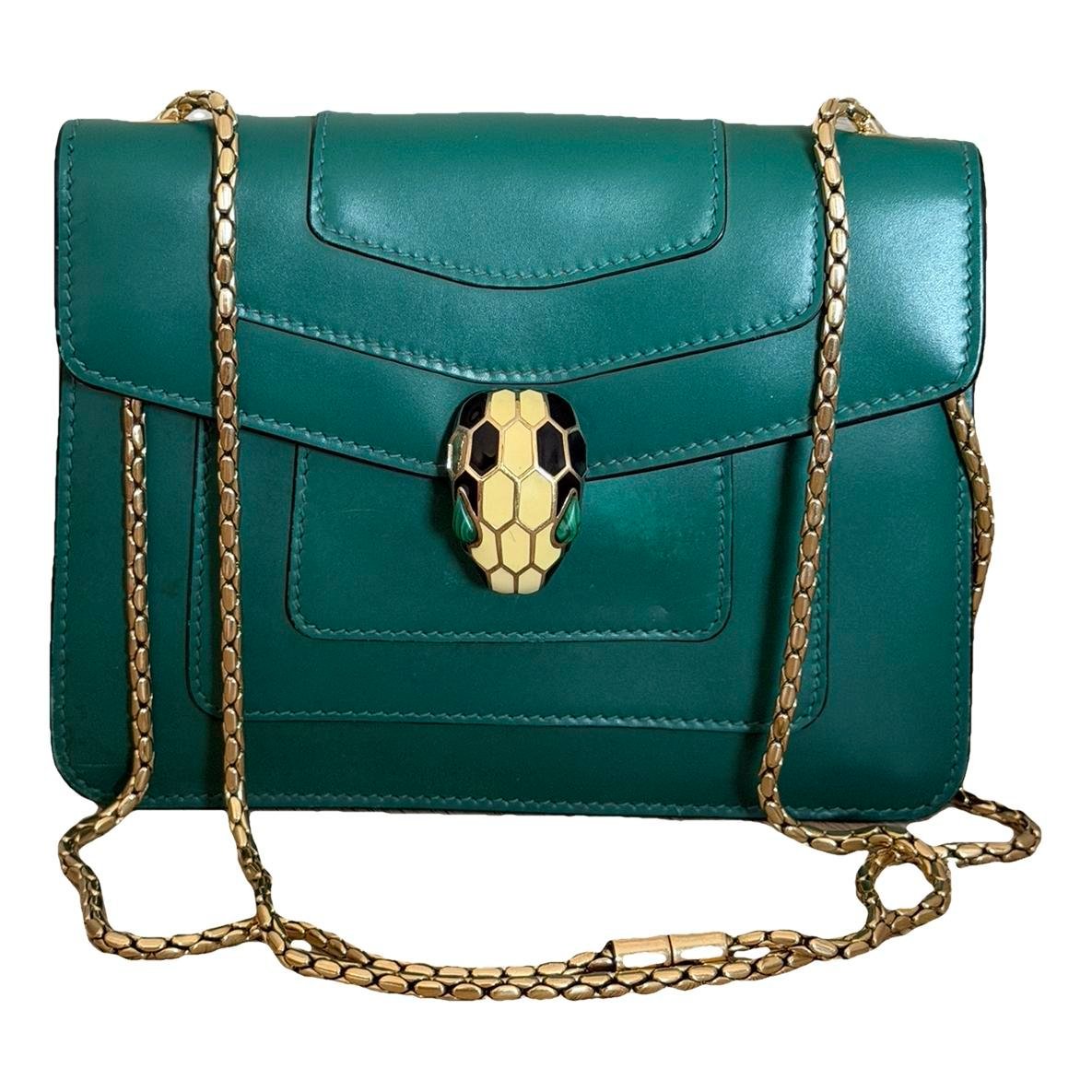 Serpenti leather clutch bag