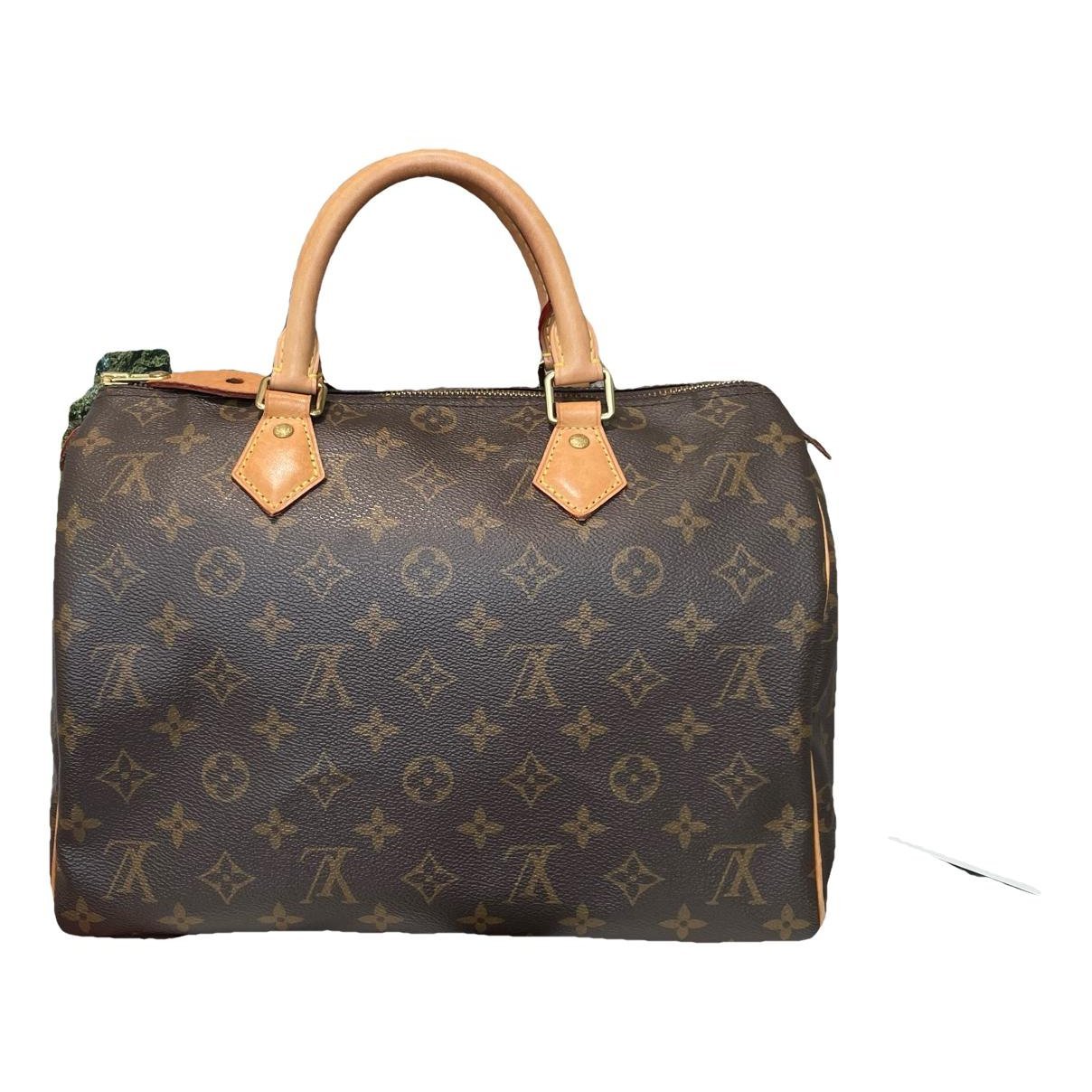 Speedy leather handbag