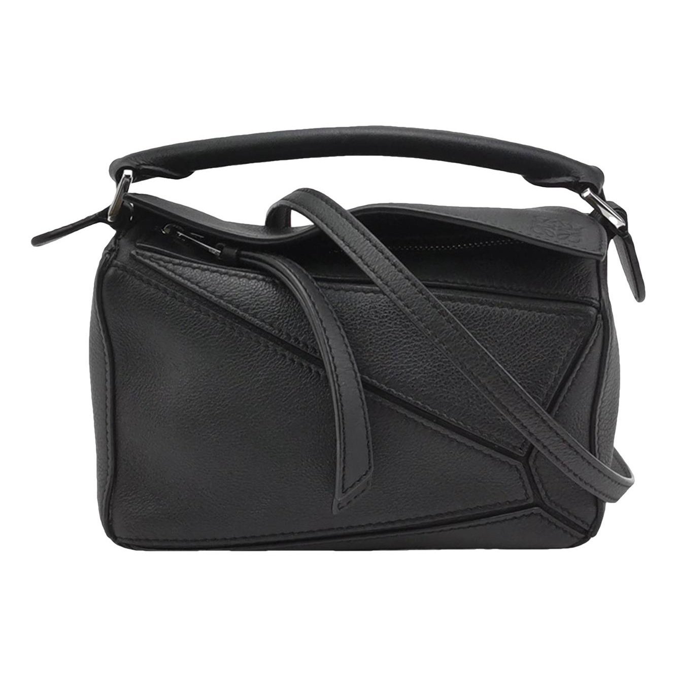 Puzzle leather handbag