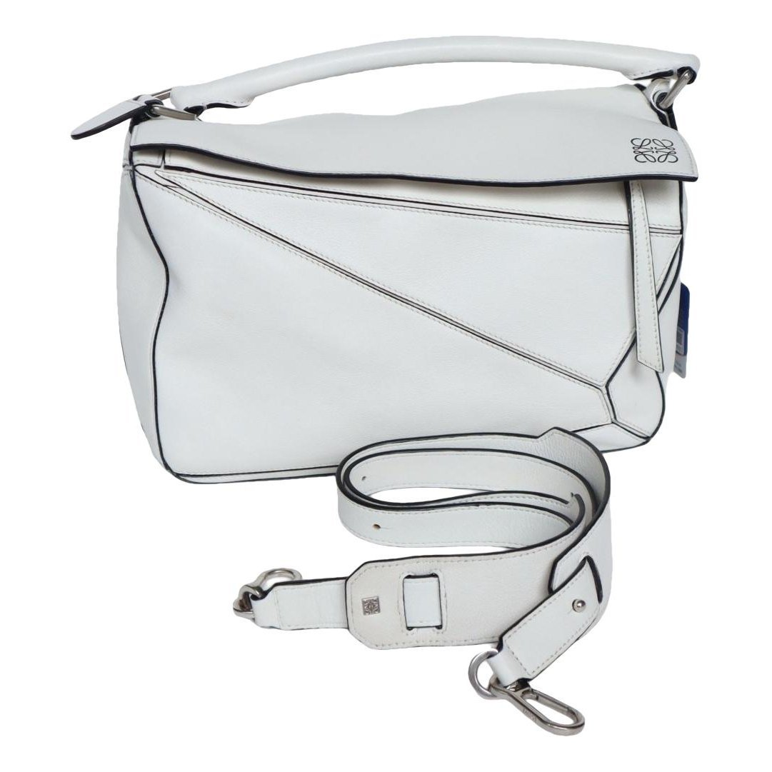 Puzzle leather handbag