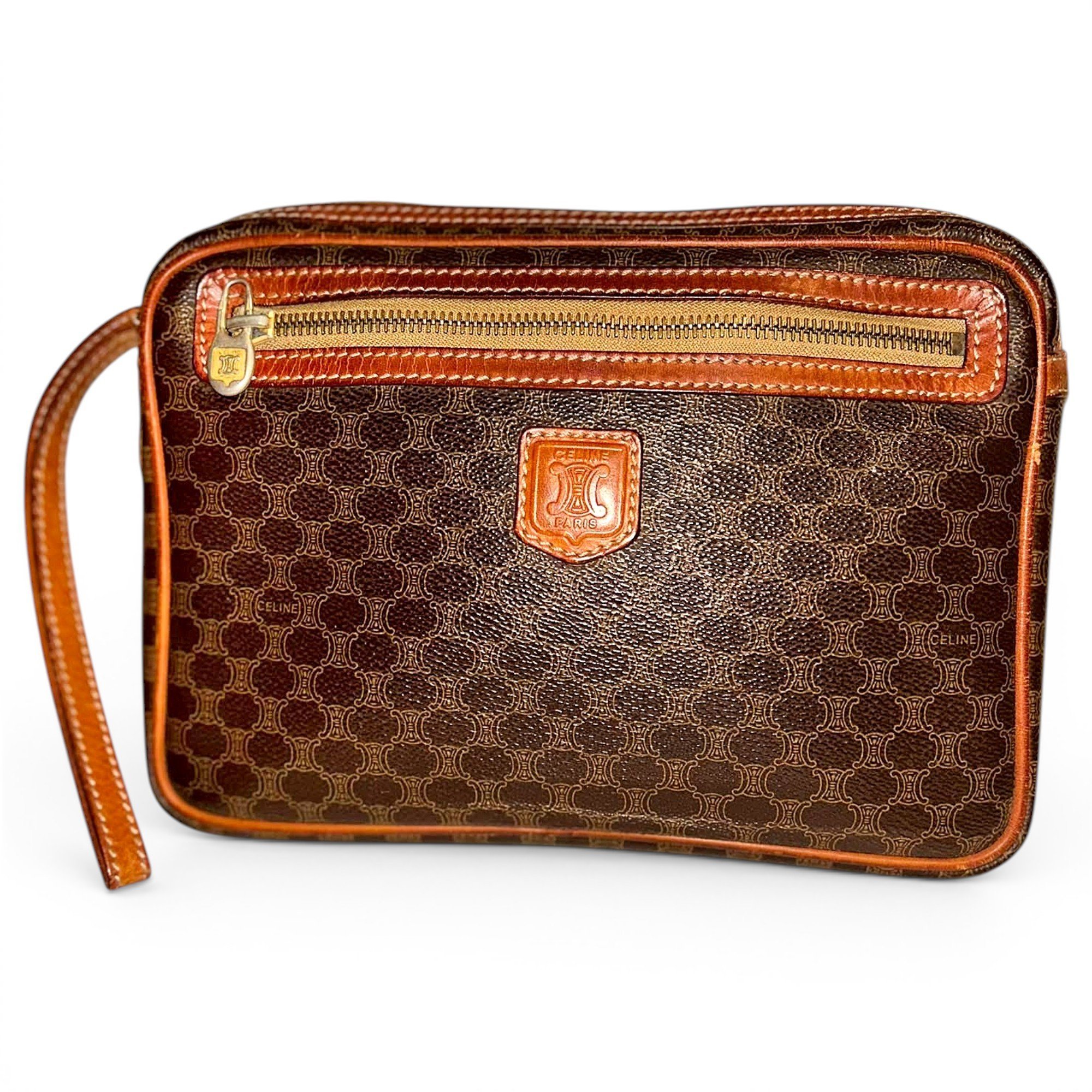 Triomphe Vintage leather clutch bag