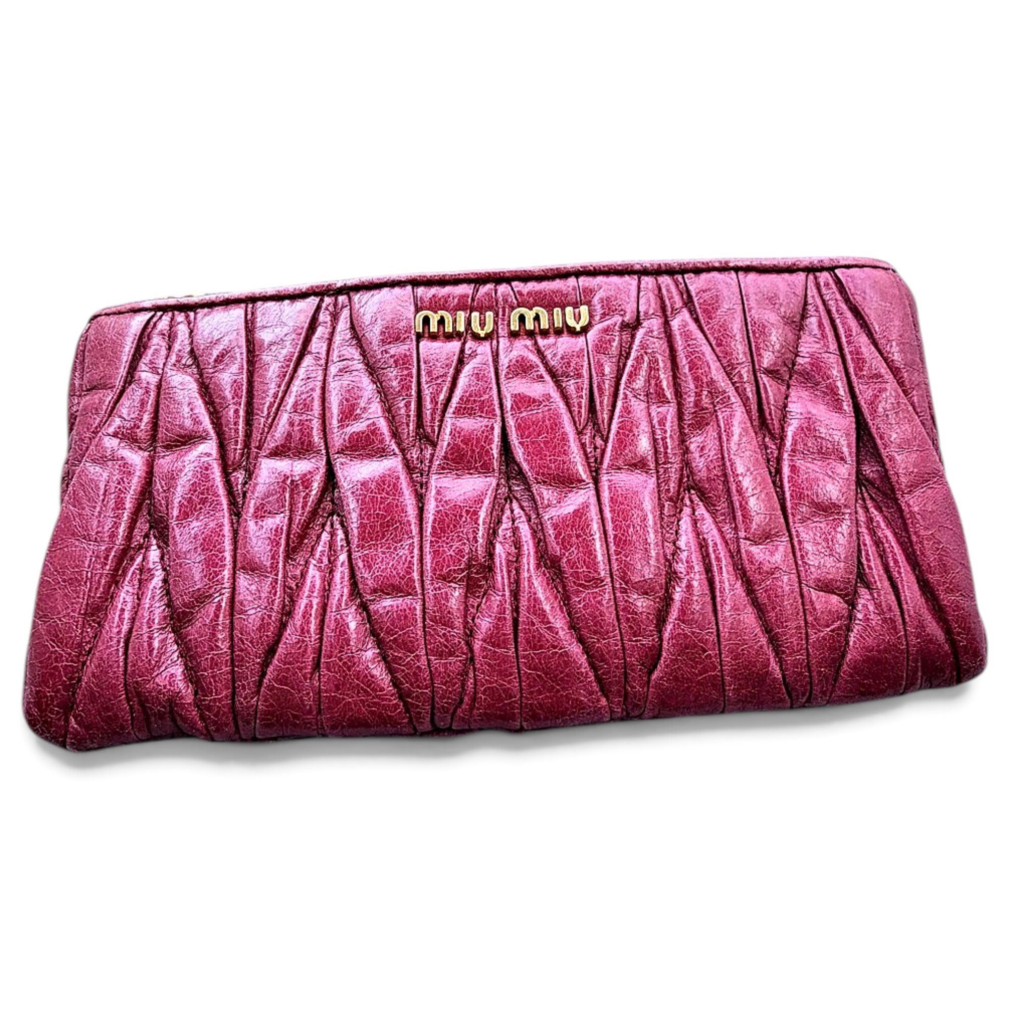 Matelassé leather clutch bag
