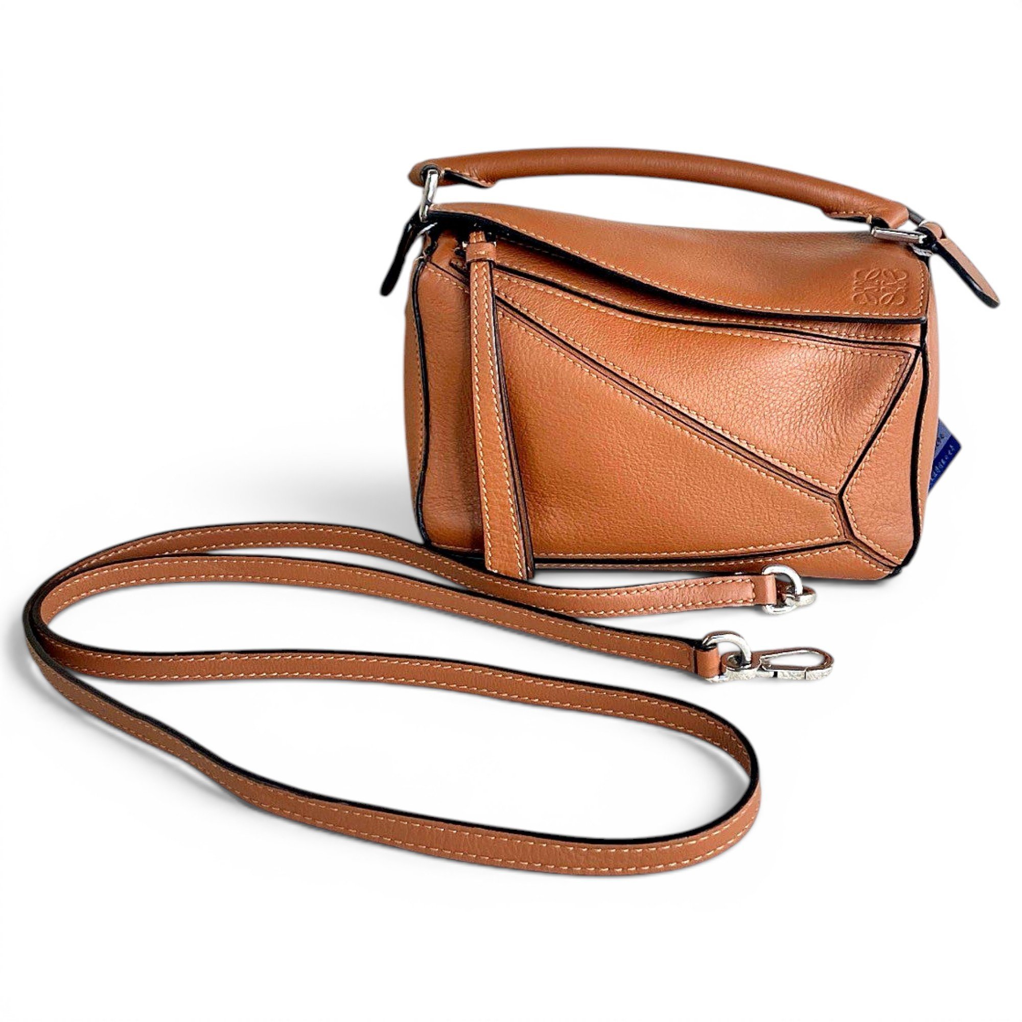 Puzzle leather handbag
