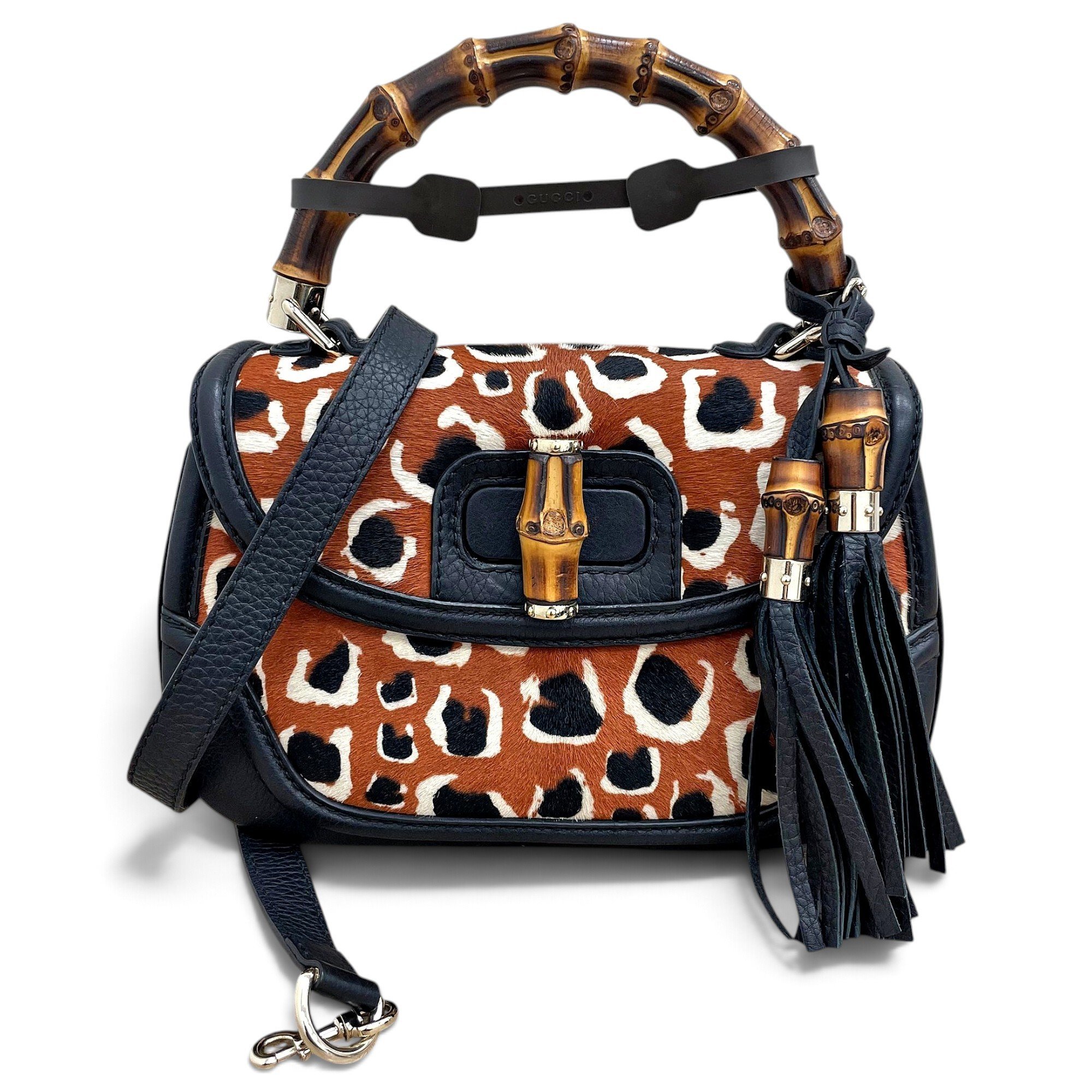 Convertible Pompon Bamboo Top Handle leather handbag