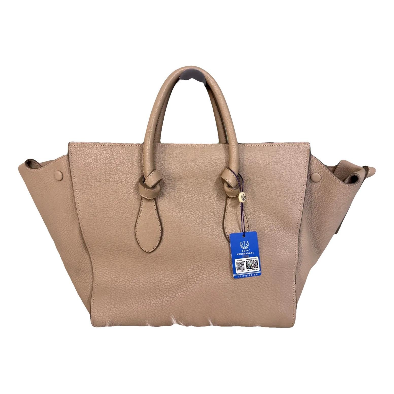 Tie leather handbag