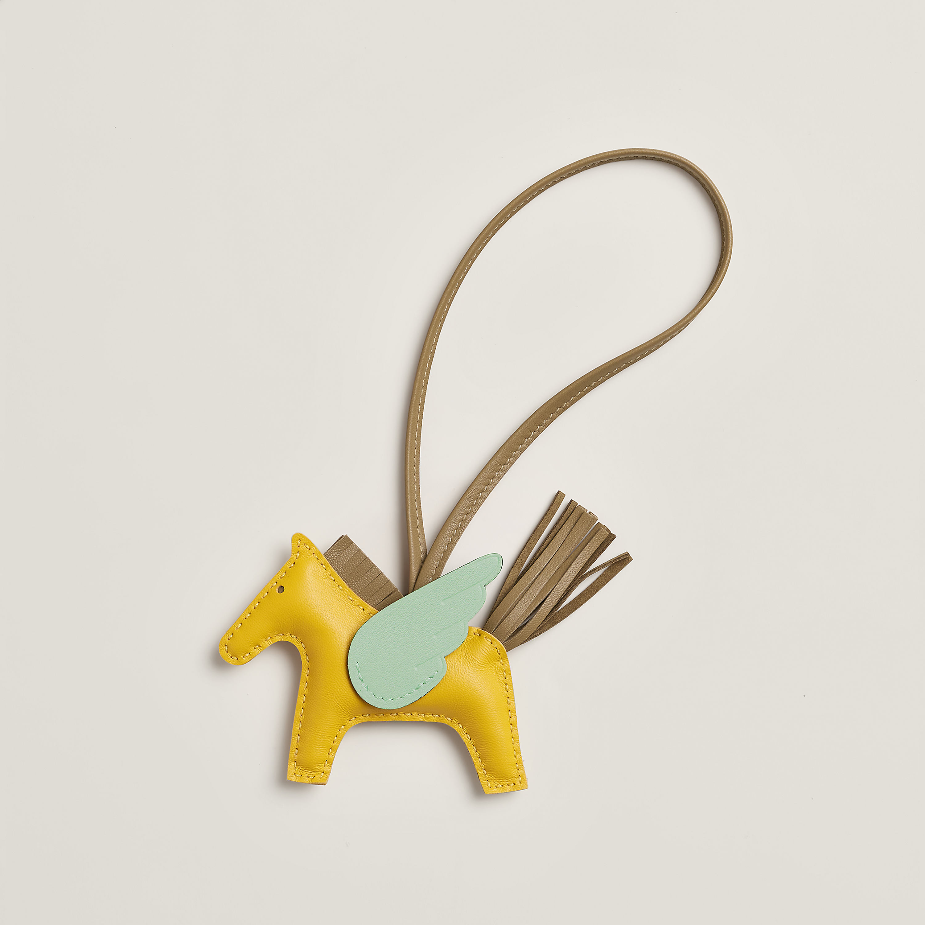 Hermès Rodeo charm in Jaune de naples