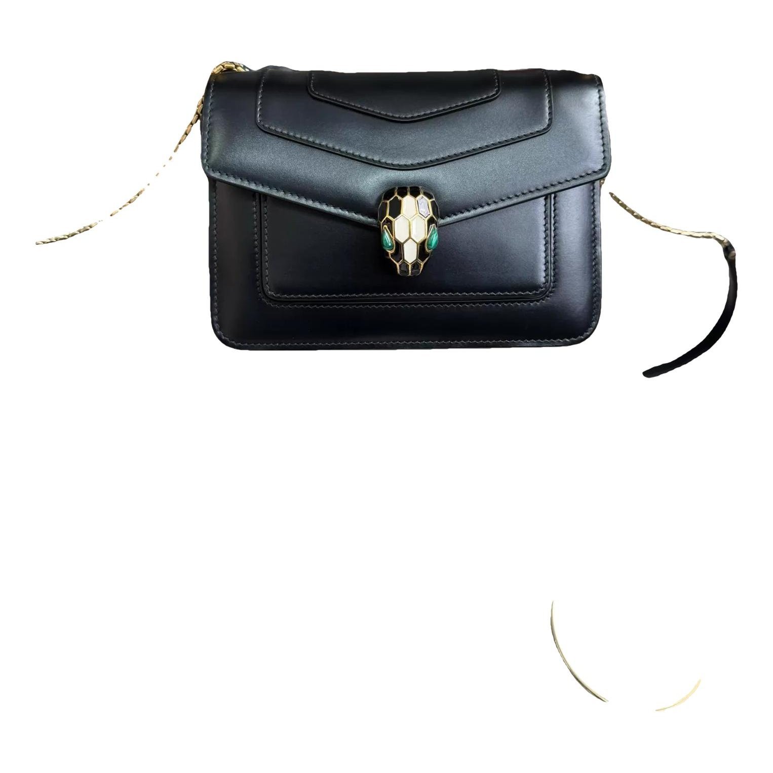 Serpenti leather handbag