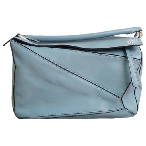 Puzzle leather handbag