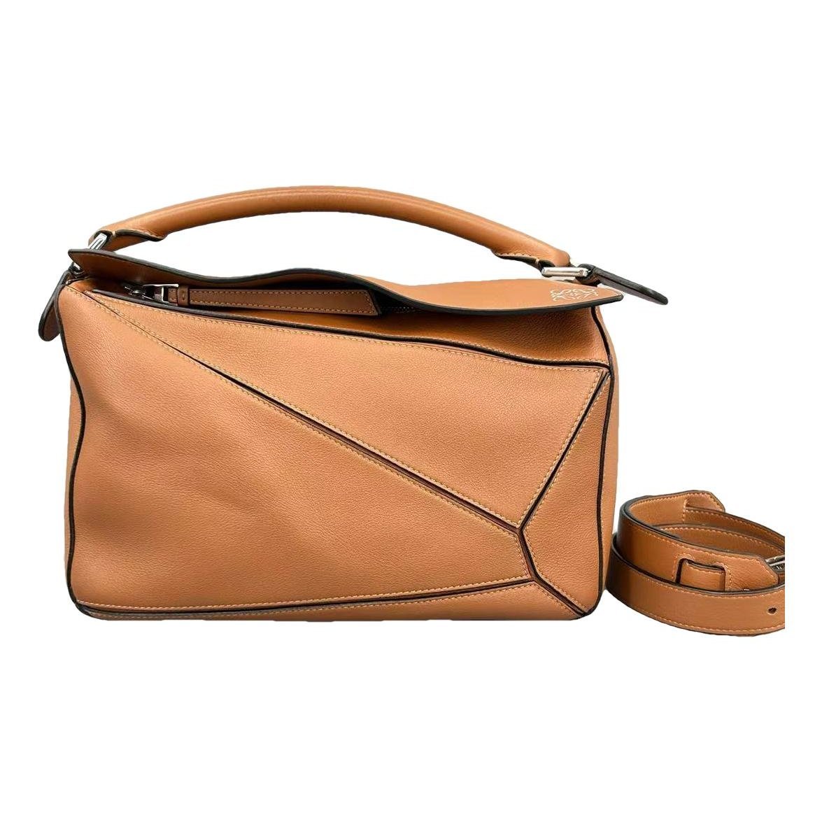 Puzzle leather handbag