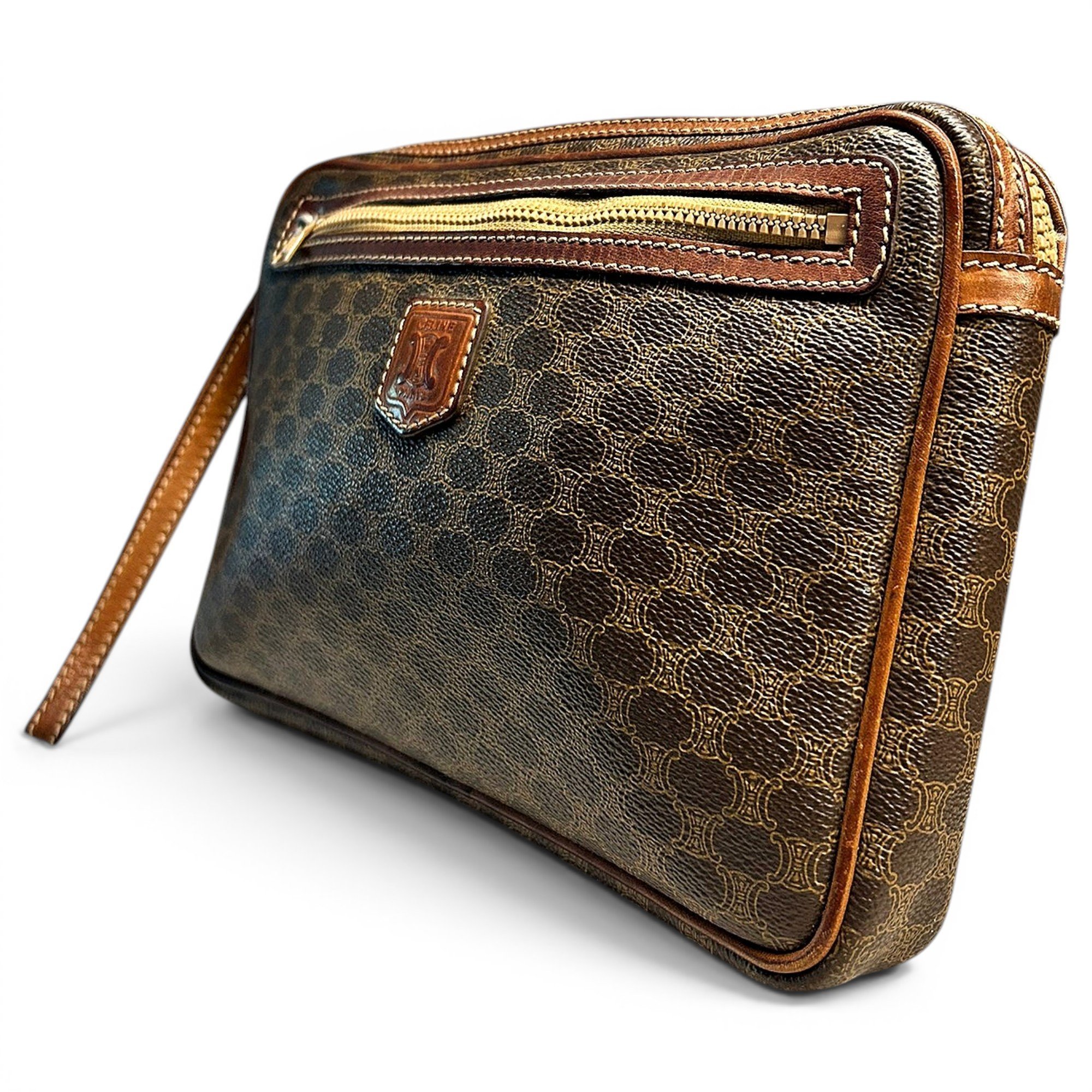 Triomphe Vintage leather clutch bag