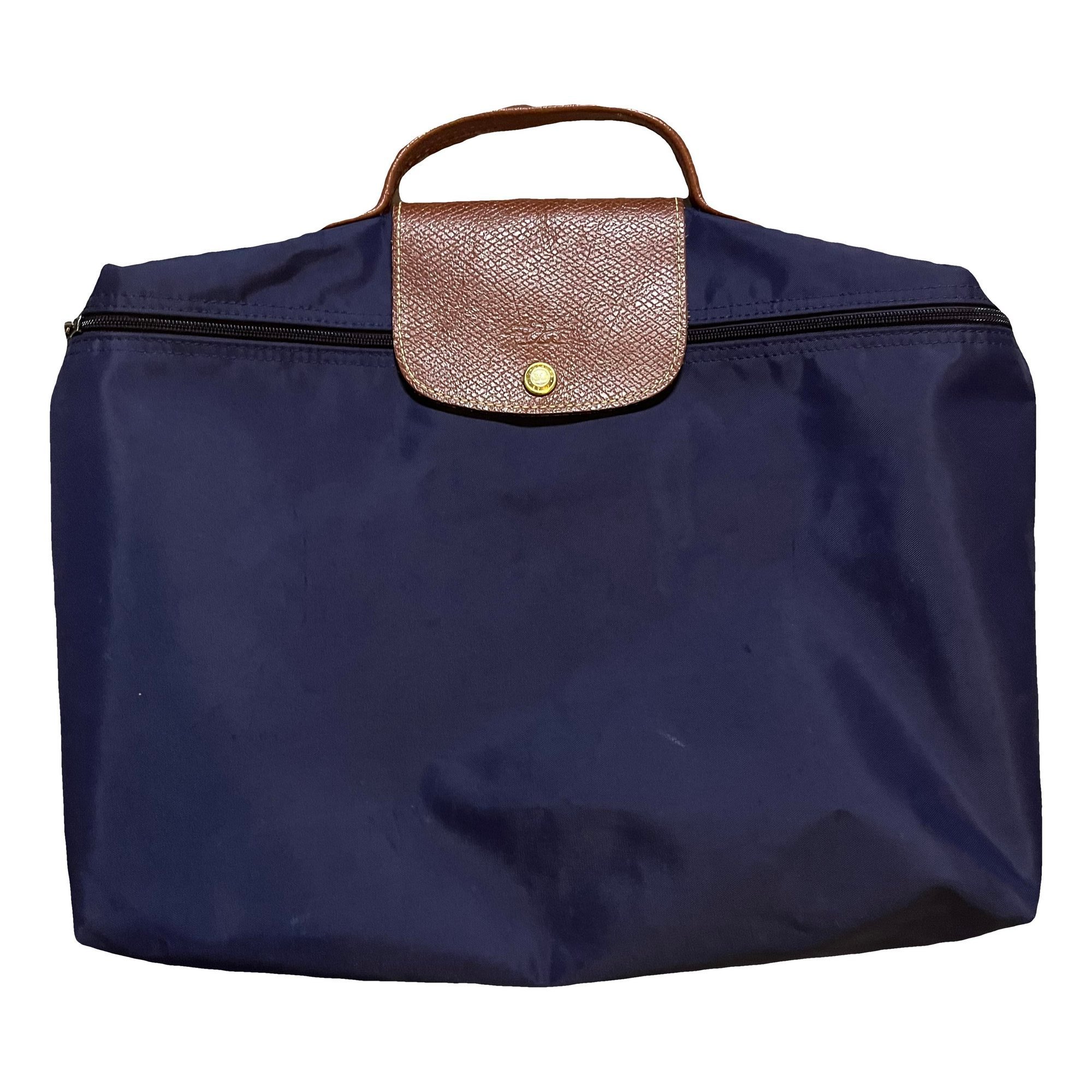 Pliage leather clutch bag