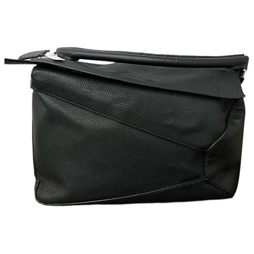 Puzzle leather handbag
