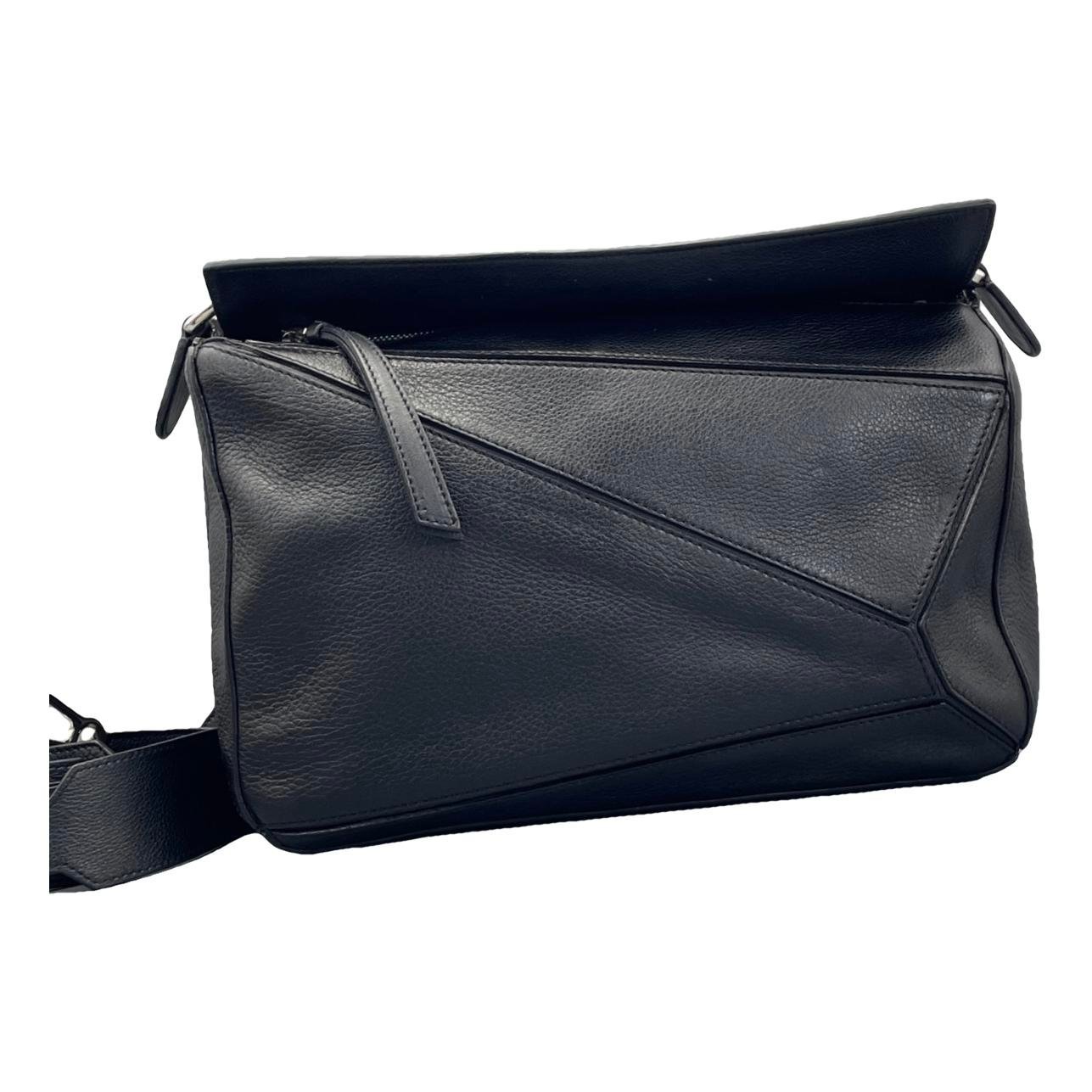 Puzzle leather handbag
