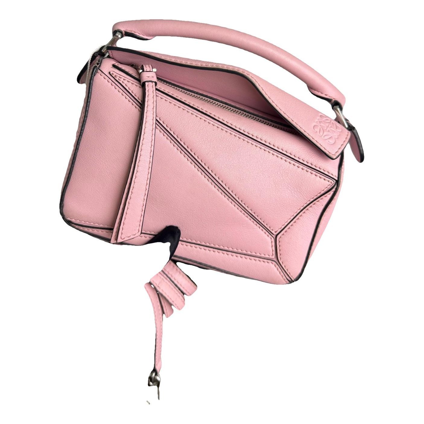 Puzzle leather handbag