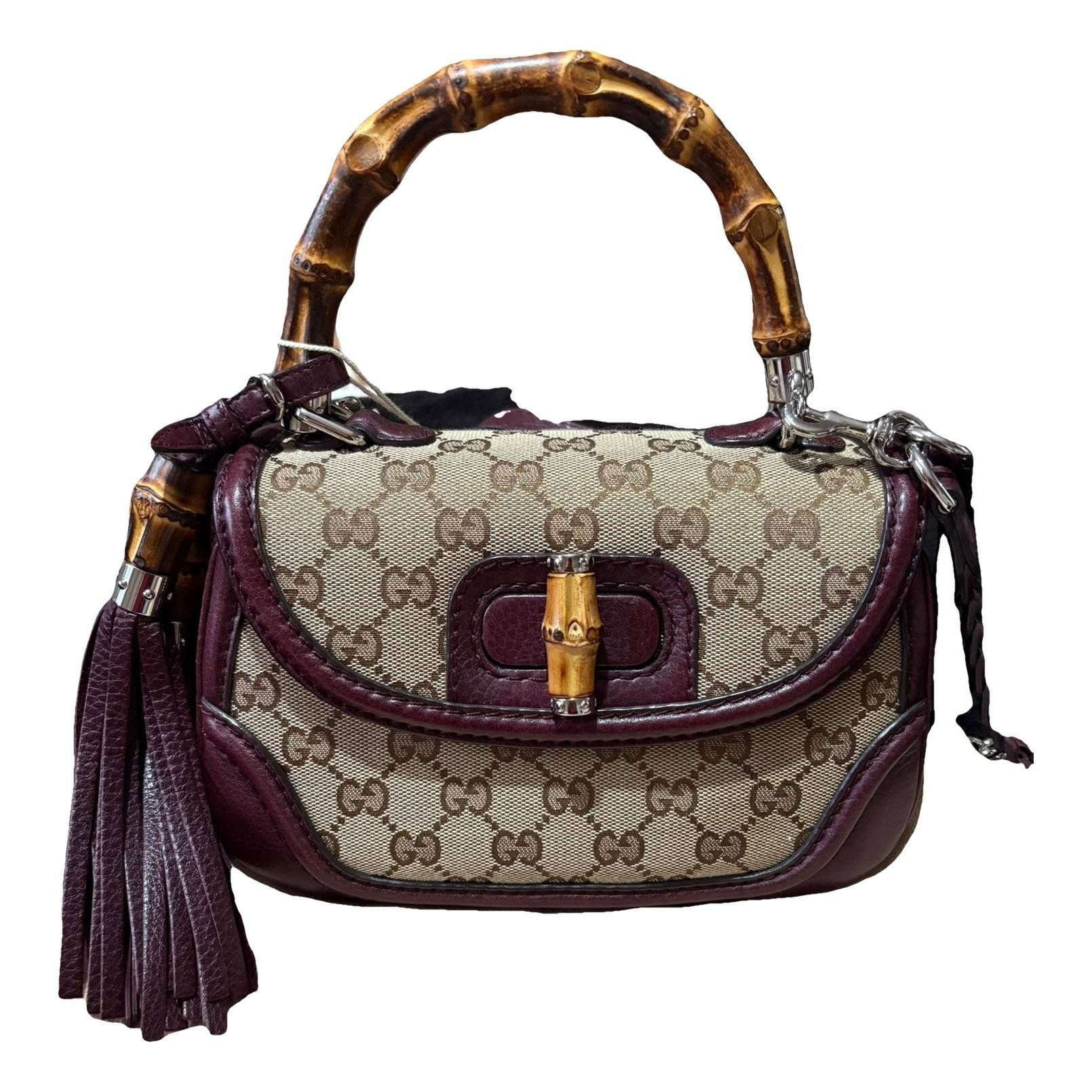Convertible Pompon Bamboo Top Handle leather handbag